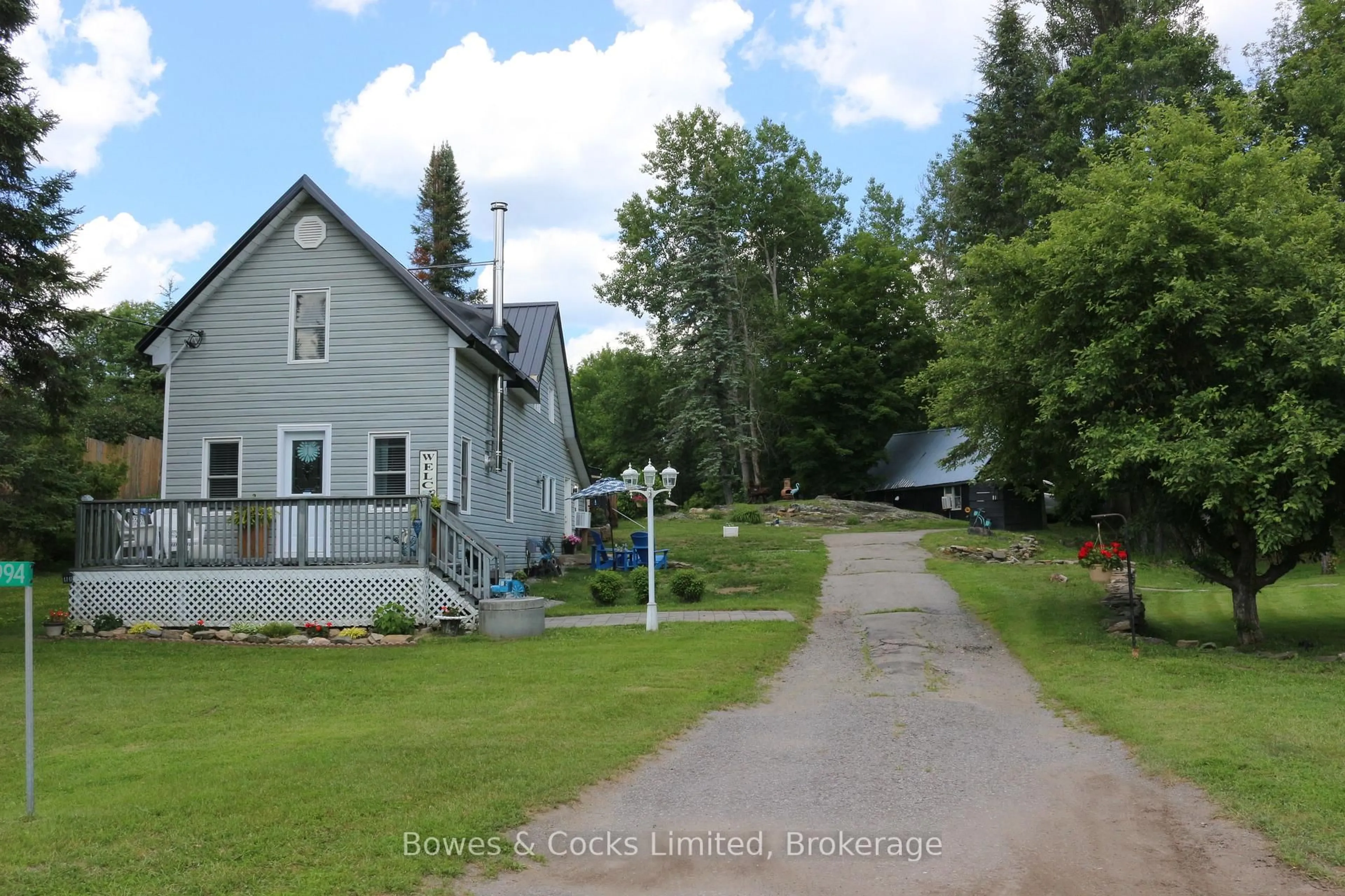 A pic from outside/outdoor area/front of a property/back of a property/a pic from drone, street for 3994 County Road 620, North Kawartha Ontario K0L 1A0