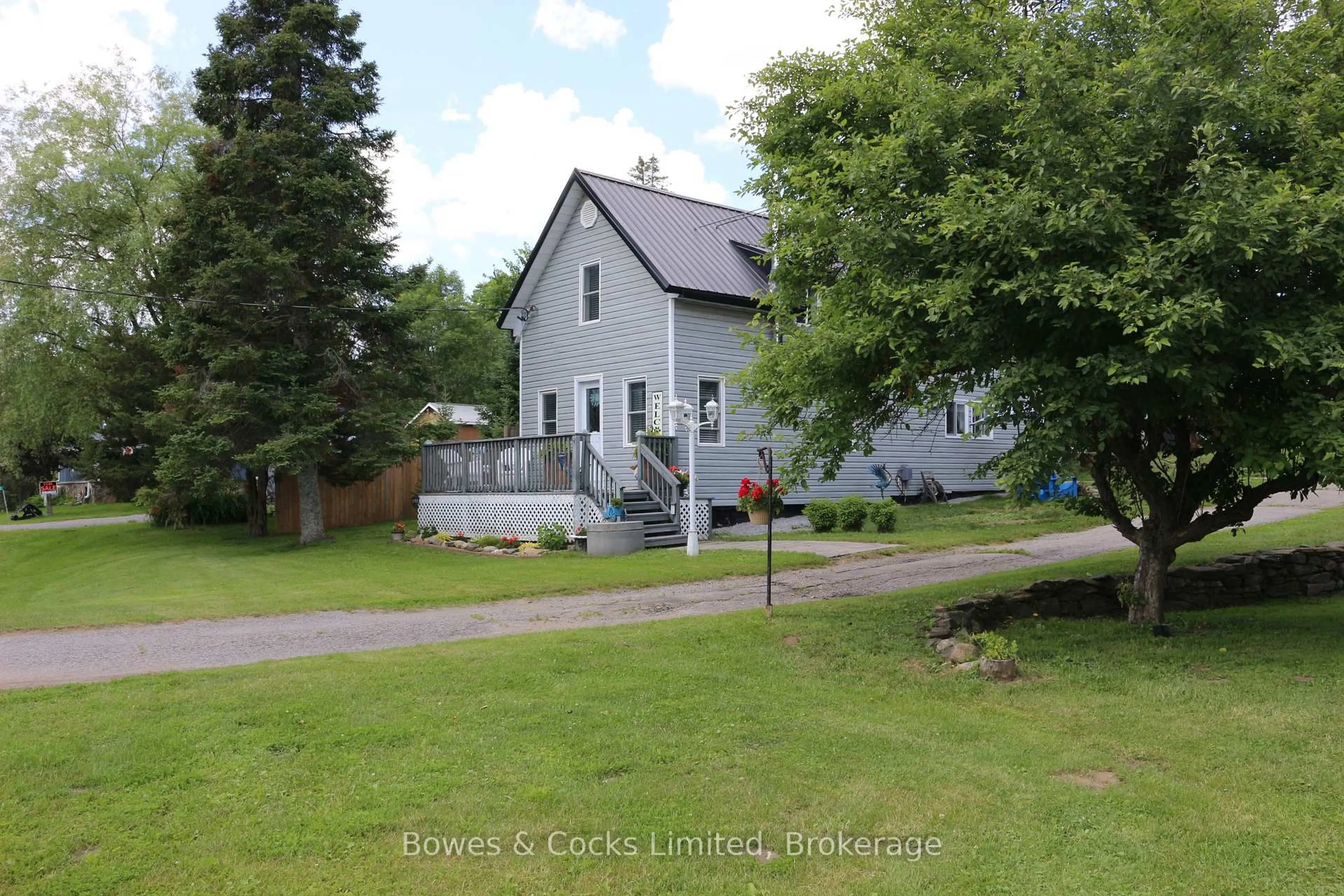 A pic from outside/outdoor area/front of a property/back of a property/a pic from drone, street for 3994 County Road 620, North Kawartha Ontario K0L 1A0