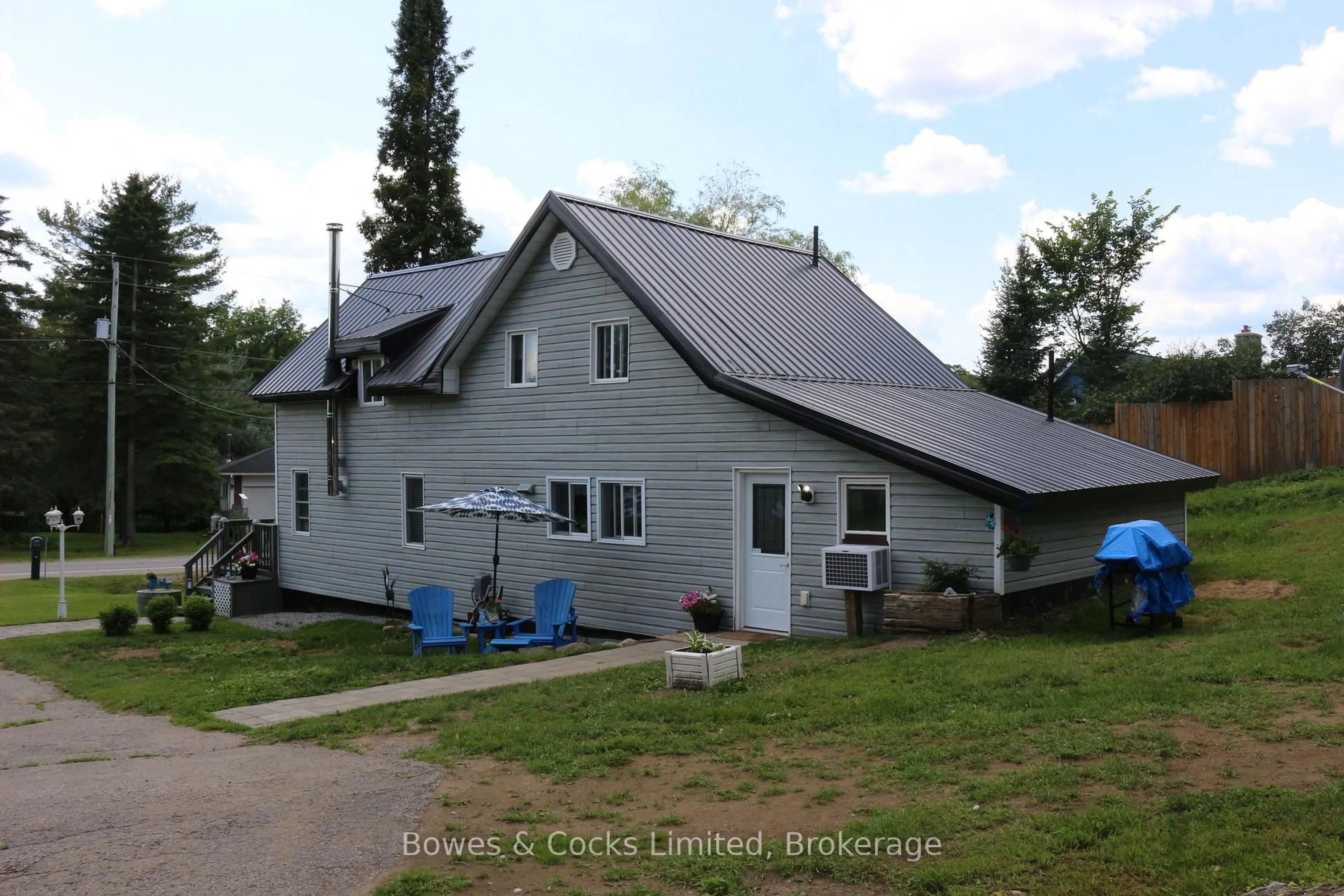 A pic from outside/outdoor area/front of a property/back of a property/a pic from drone, street for 3994 County Road 620, North Kawartha Ontario K0L 1A0