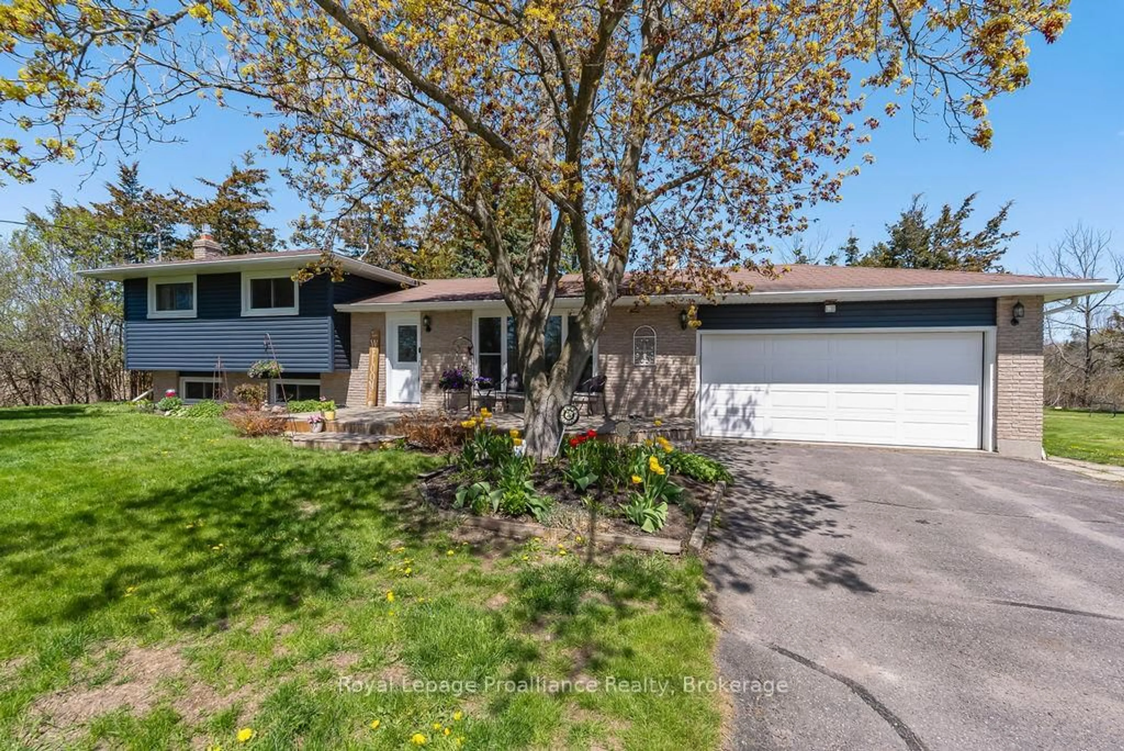 Home with vinyl exterior material, street for 202 Huntingwood Dr, Belleville Ontario K8N 4Z5