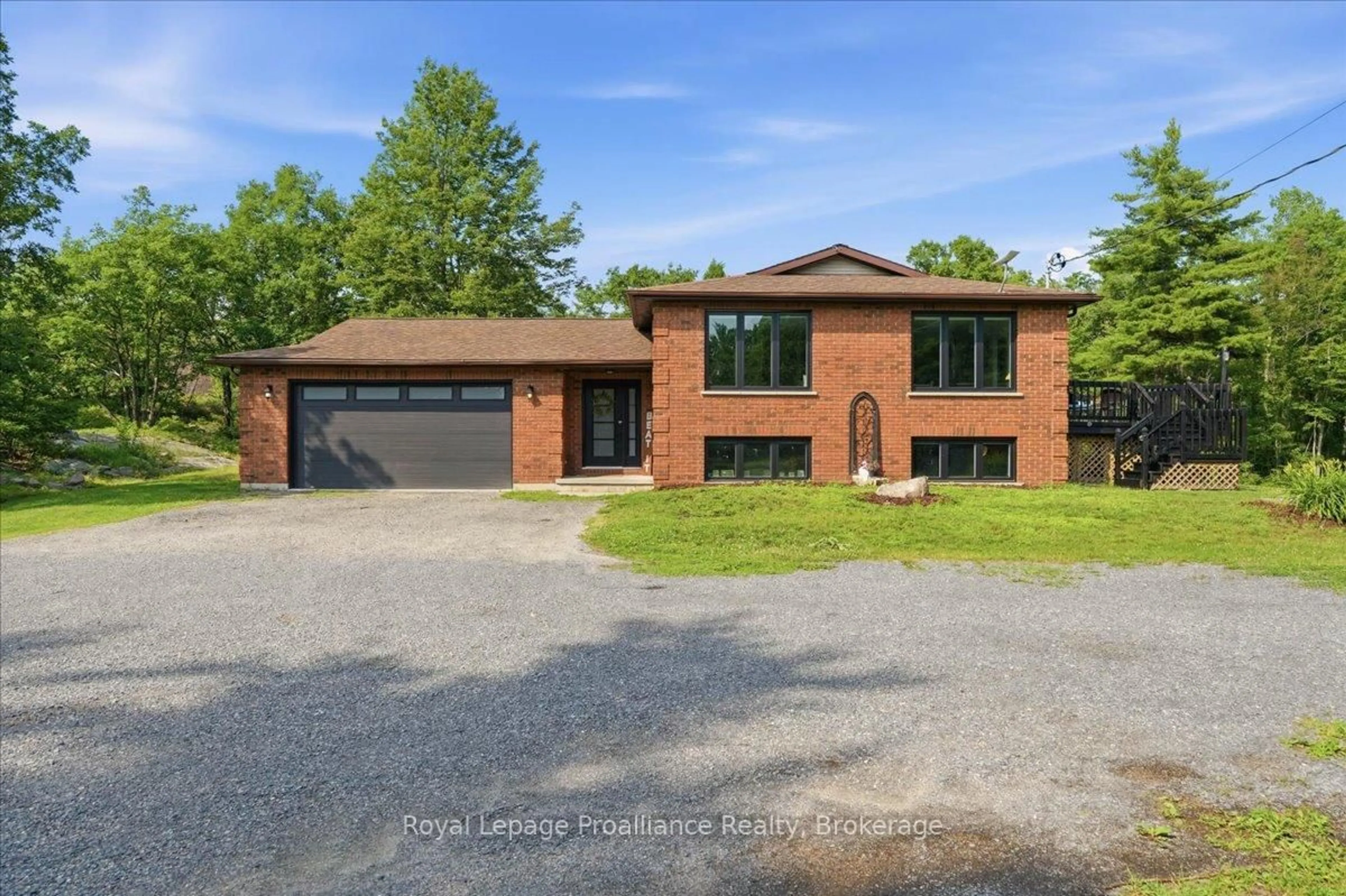Home with brick exterior material, street for 10389 Highway 41, Kaladar Ontario K0H 1Z0