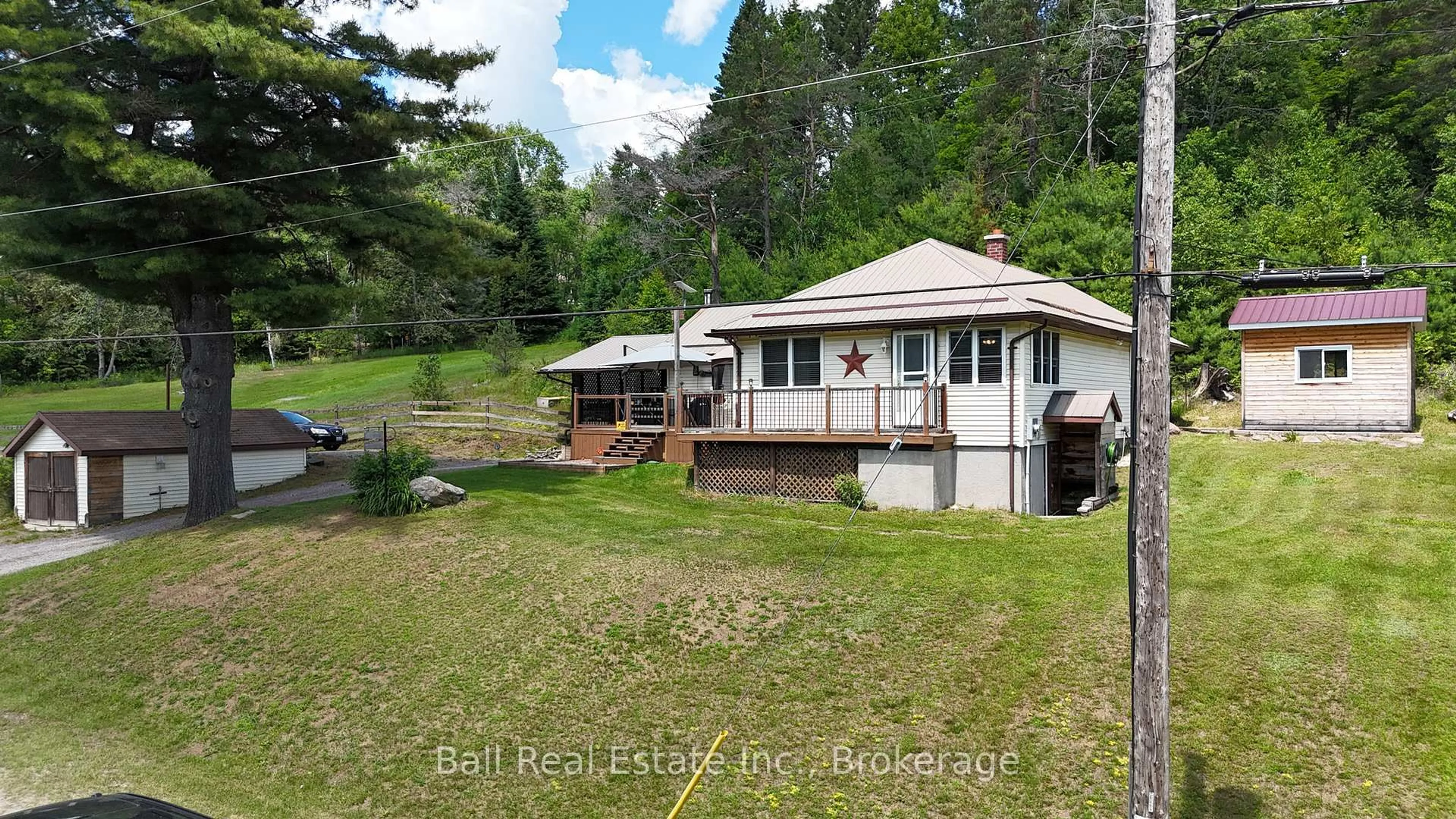 A pic from outside/outdoor area/front of a property/back of a property/a pic from drone, water/lake/river/ocean view for 1123 Harcourt Rd, Dysart et al Ontario K0L 1X0