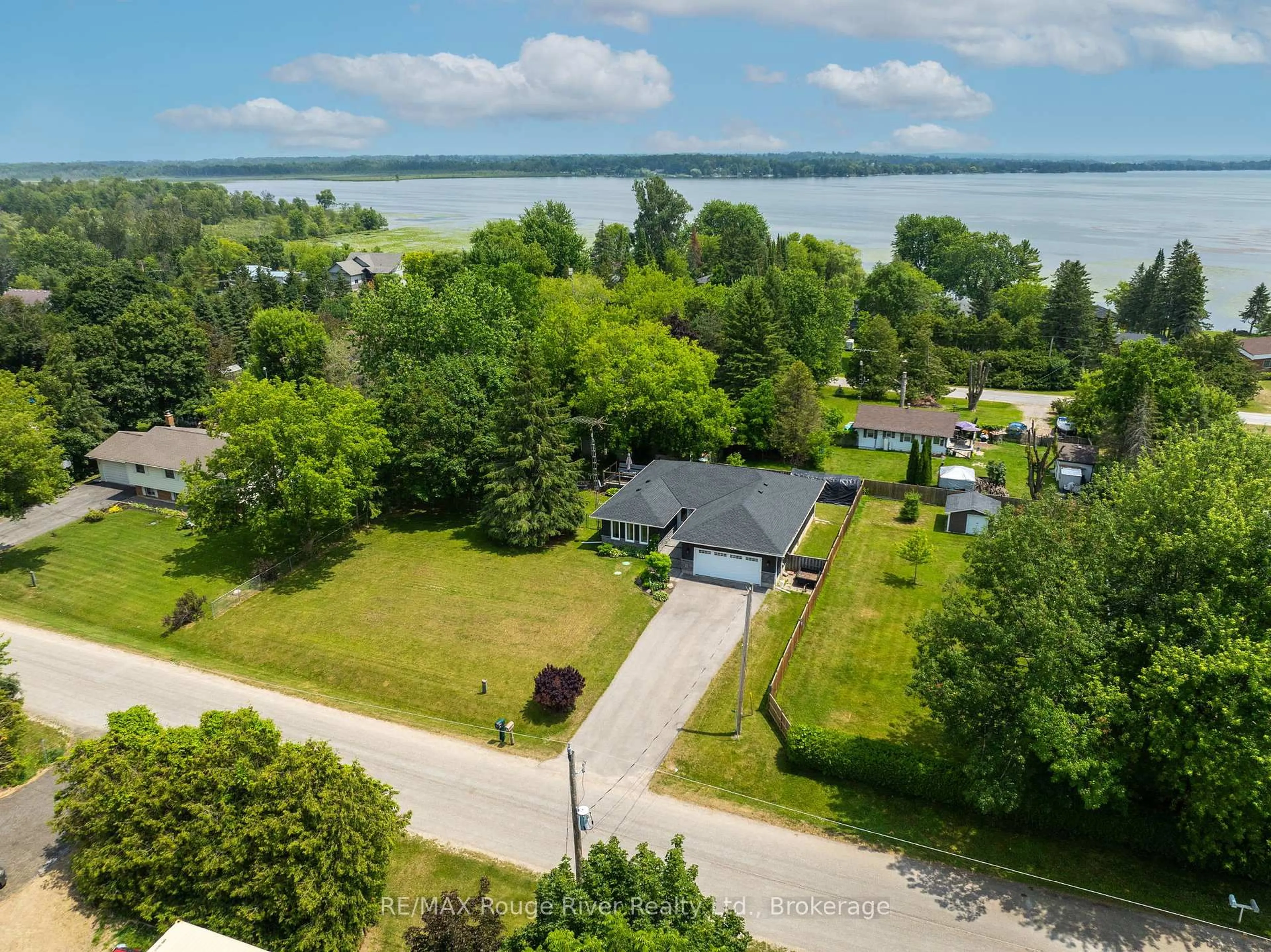 A pic from outside/outdoor area/front of a property/back of a property/a pic from drone, water/lake/river/ocean view for 257 Port Hoover Rd, Kawartha Lakes Ontario K0M 2C0