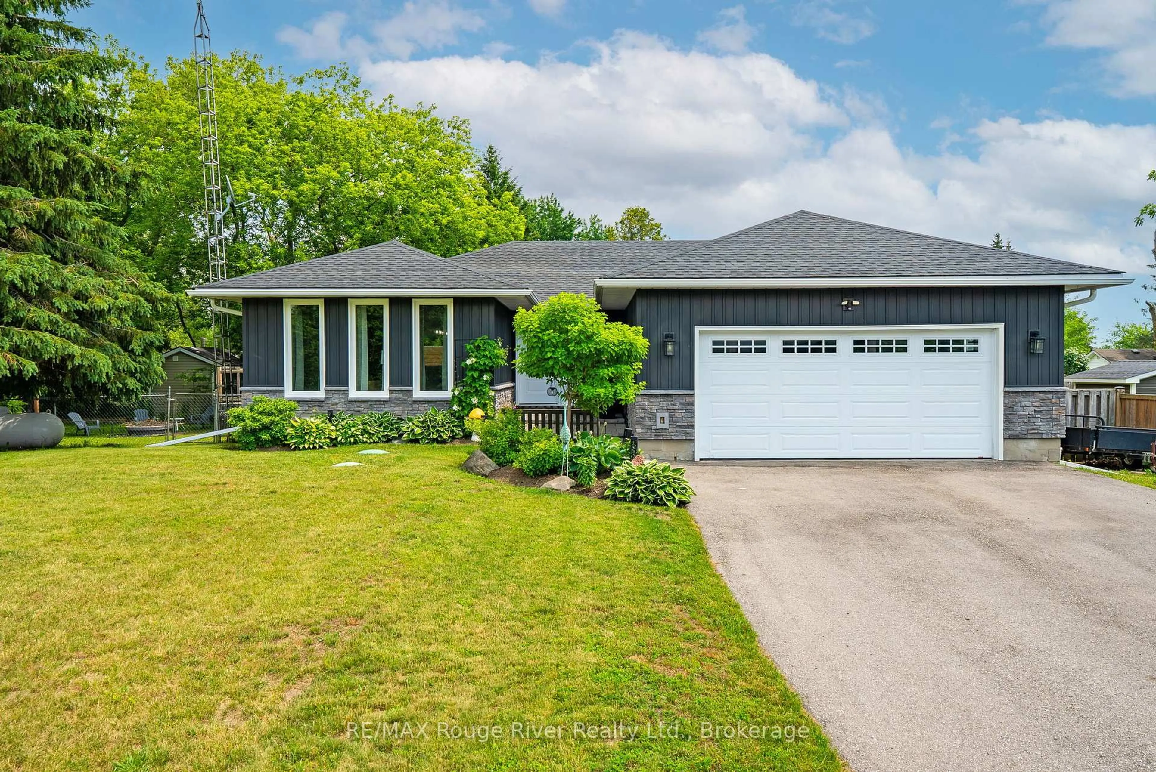 Home with vinyl exterior material, street for 257 Port Hoover Rd, Kawartha Lakes Ontario K0M 2C0