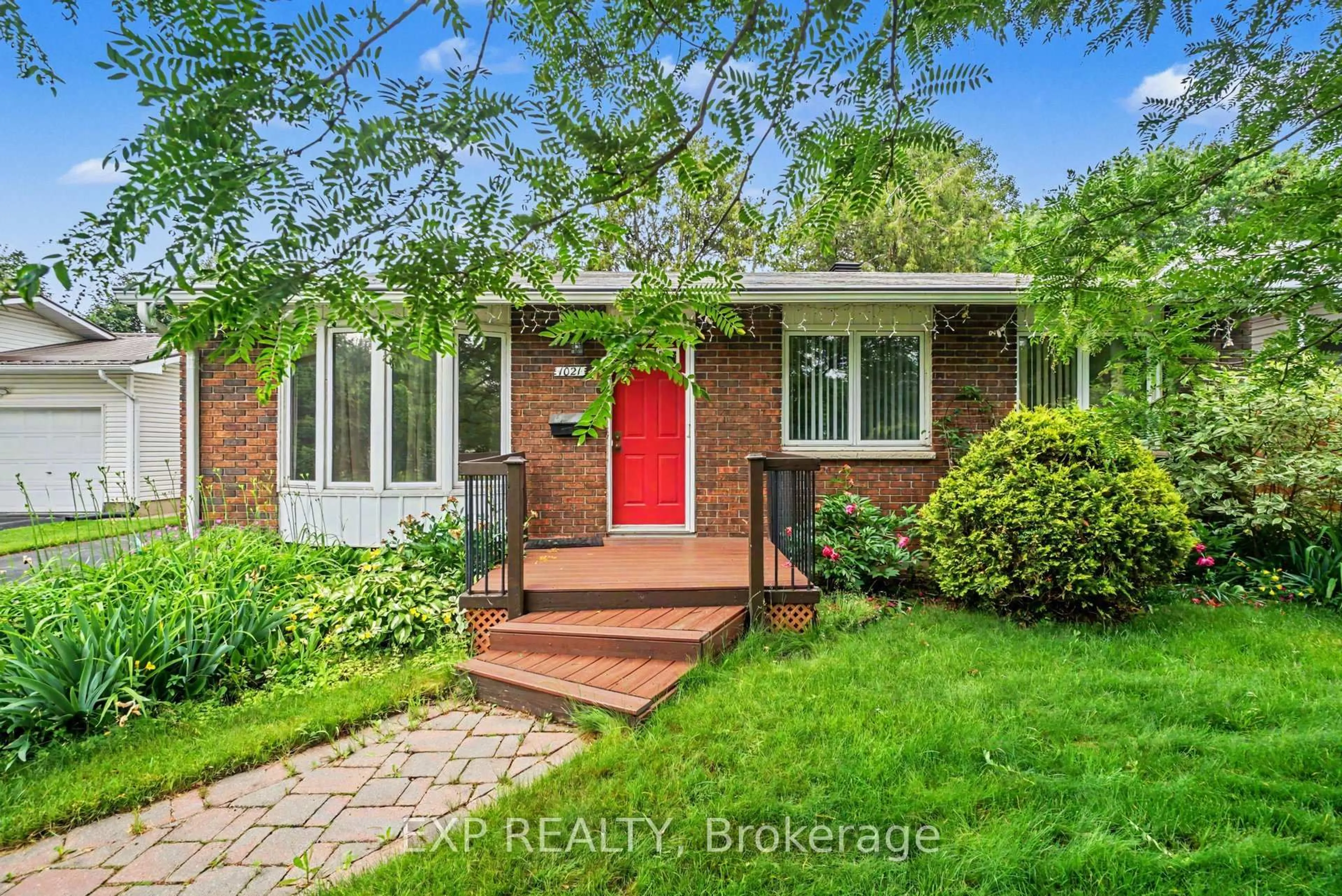 Home with brick exterior material, street for 1021 Cadboro Rd, Ottawa Ontario K1J 8C8