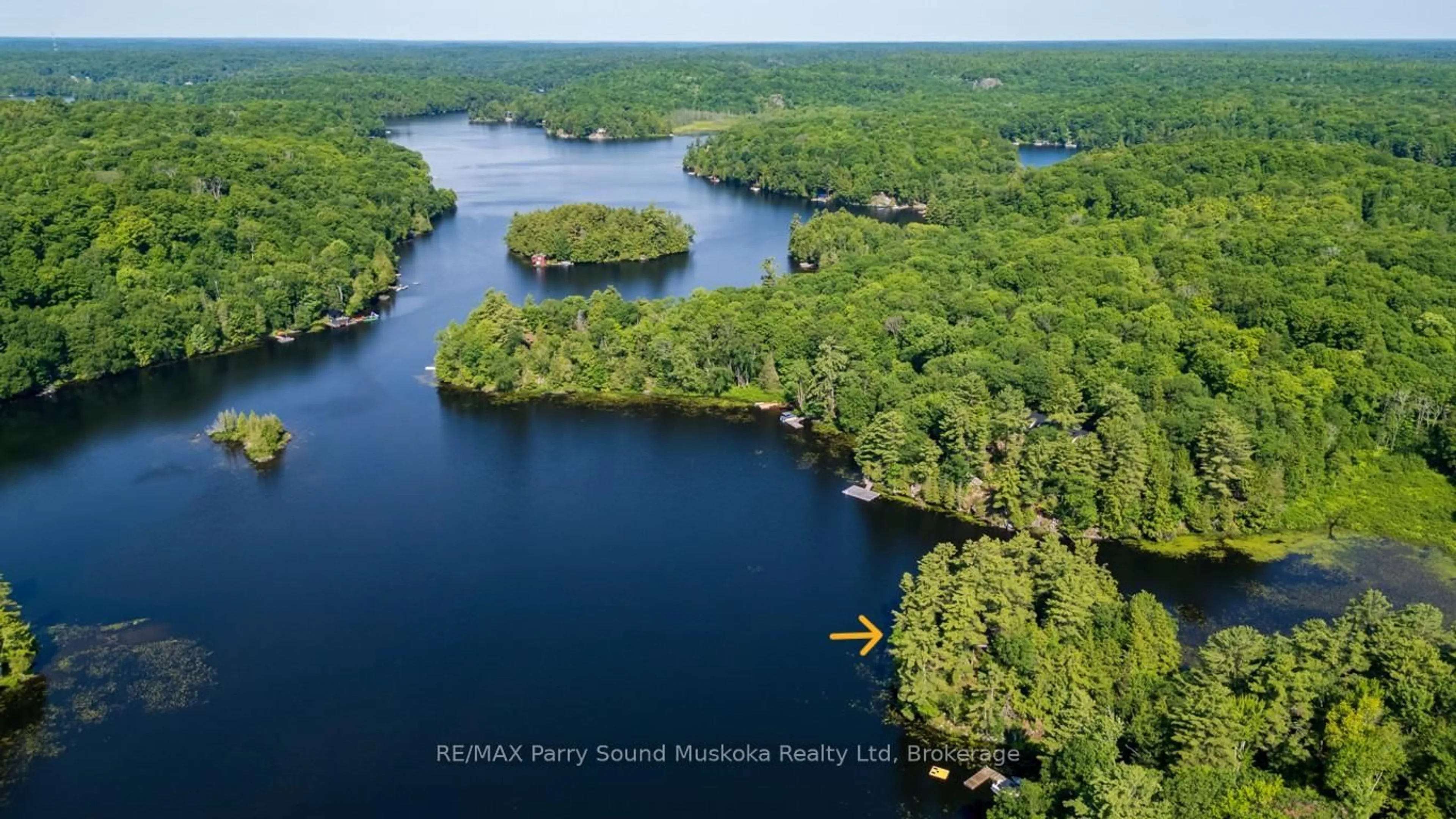 A pic from outside/outdoor area/front of a property/back of a property/a pic from drone, water/lake/river/ocean view for 509 Horseshoe Lake WA, Seguin Ontario P2A 2W8