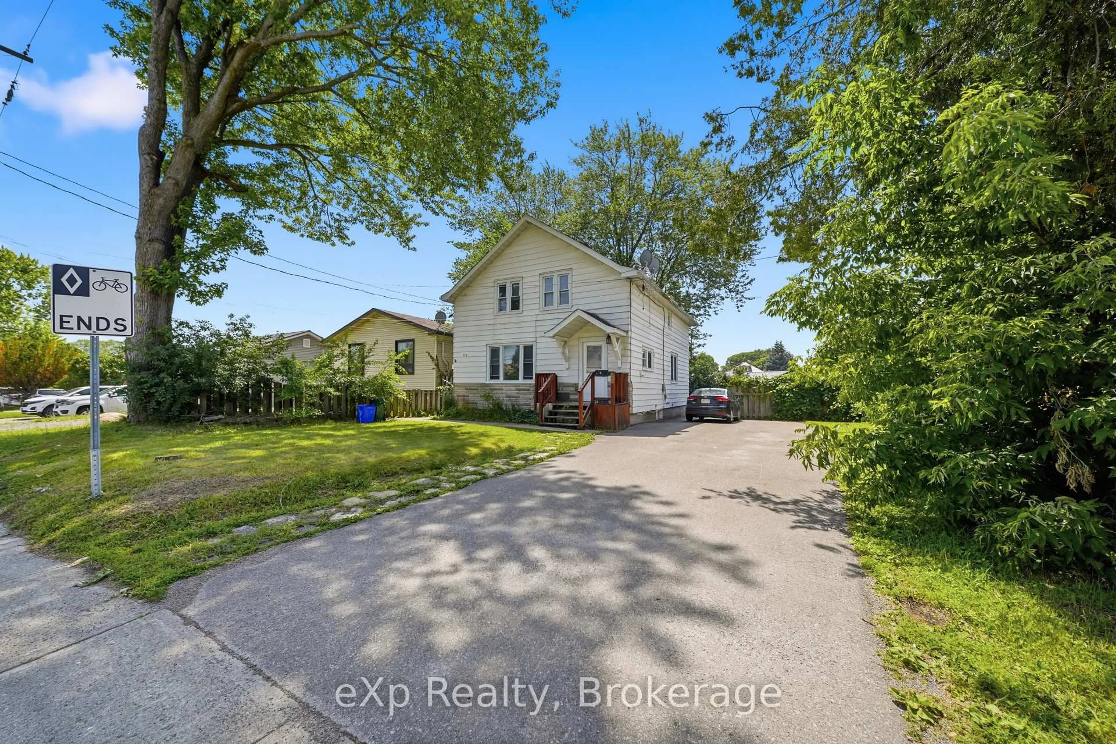 A pic from outside/outdoor area/front of a property/back of a property/a pic from drone, street for 326 Sidney St, Quinte West Ontario K8V 2T9