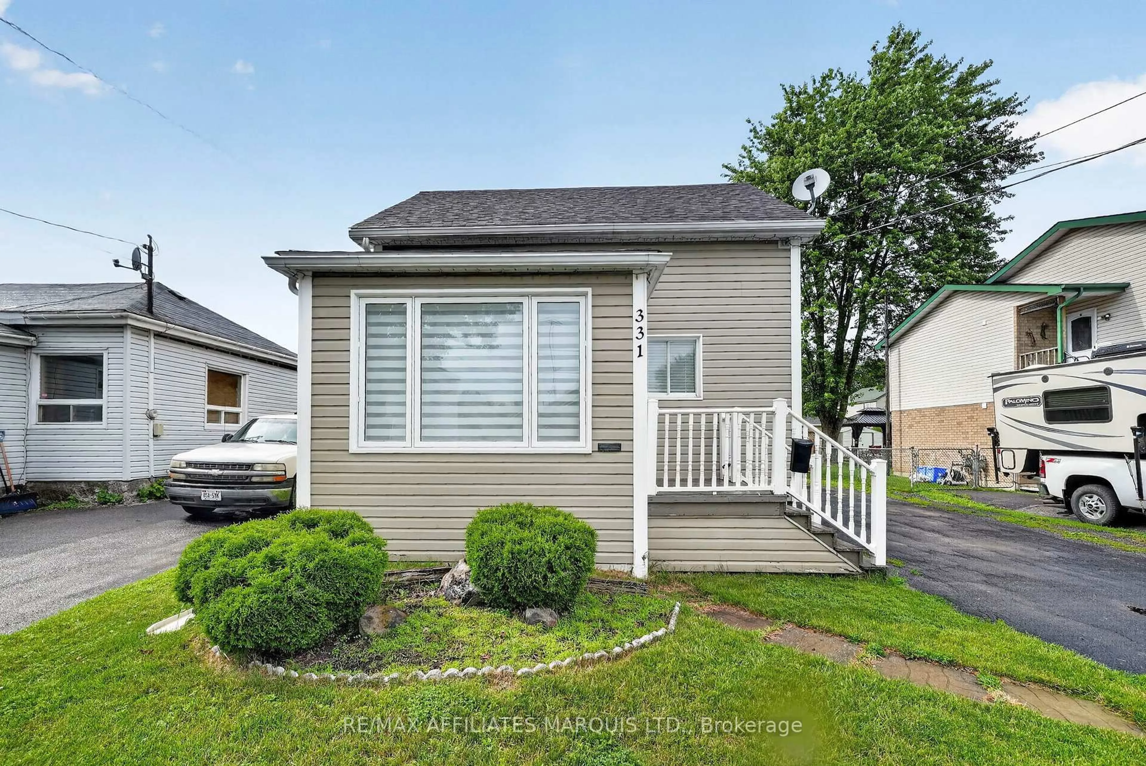 Home with vinyl exterior material, street for 331 Sixth St, Cornwall Ontario K6J 2X1