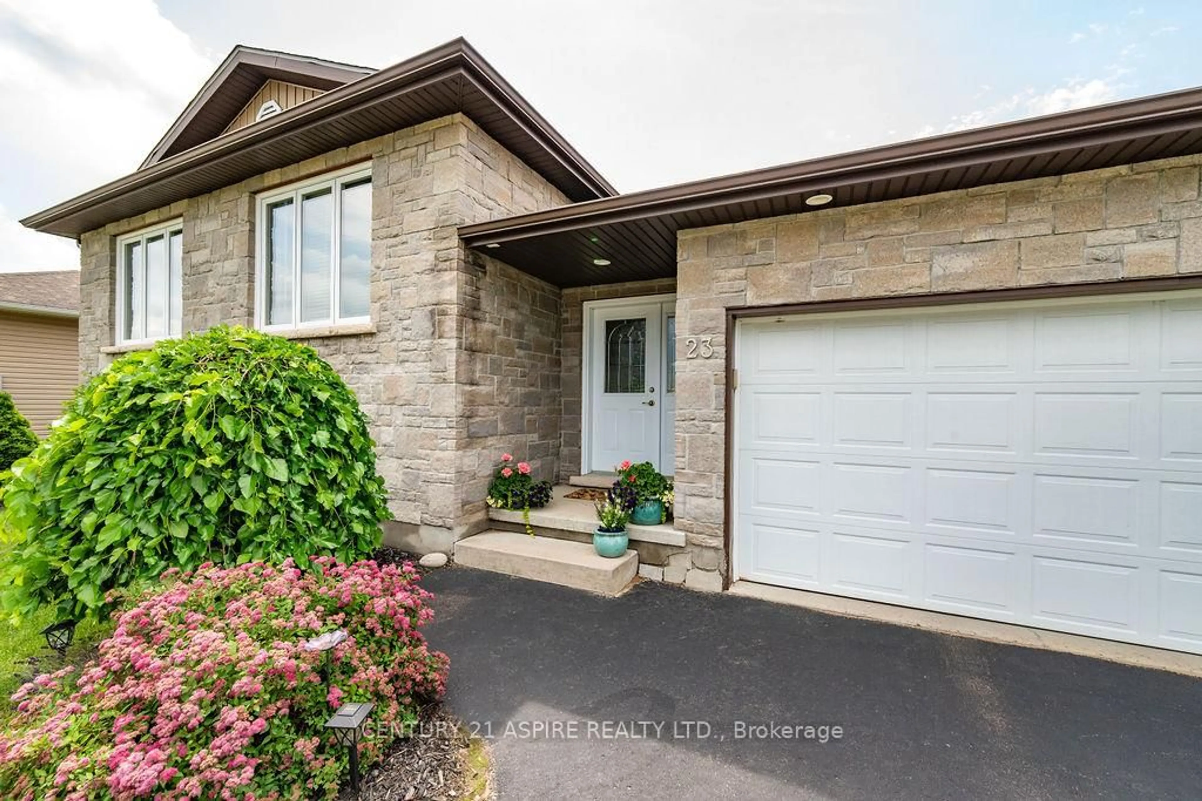 Home with brick exterior material, street for 23 Boulder Creek Tr, Petawawa Ontario K8H 0B2
