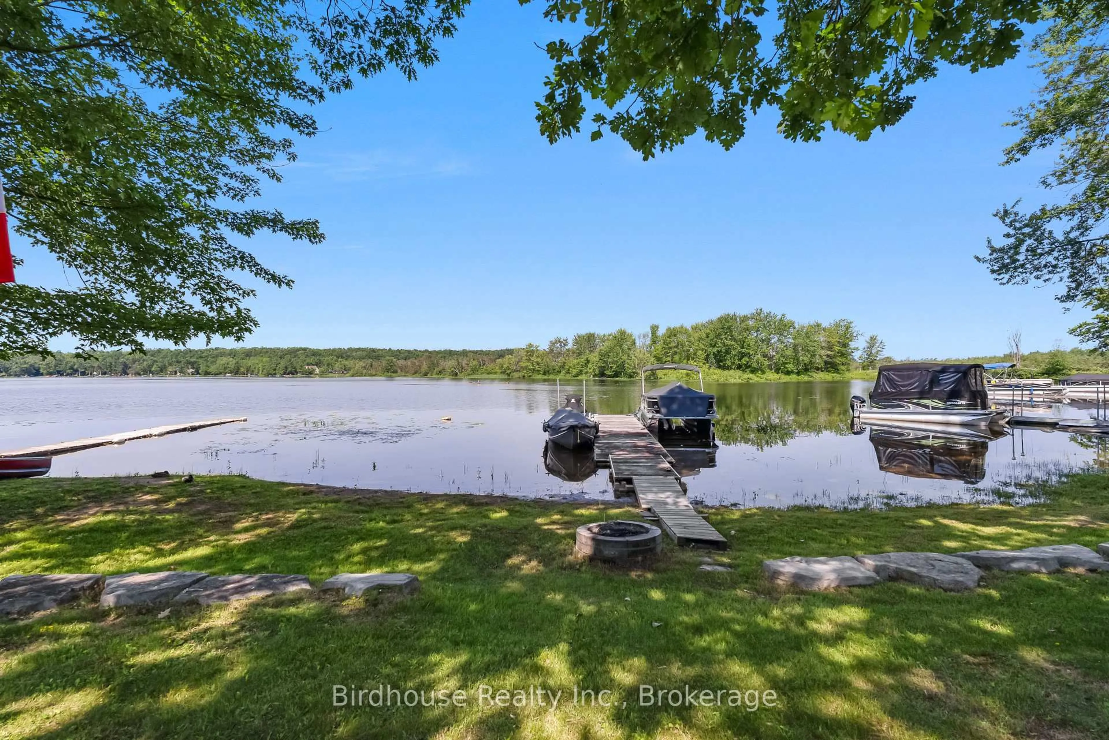 A pic from outside/outdoor area/front of a property/back of a property/a pic from drone, water/lake/river/ocean view for 210 North Shore Rd, Kawartha Lakes Ontario K0M 2B0