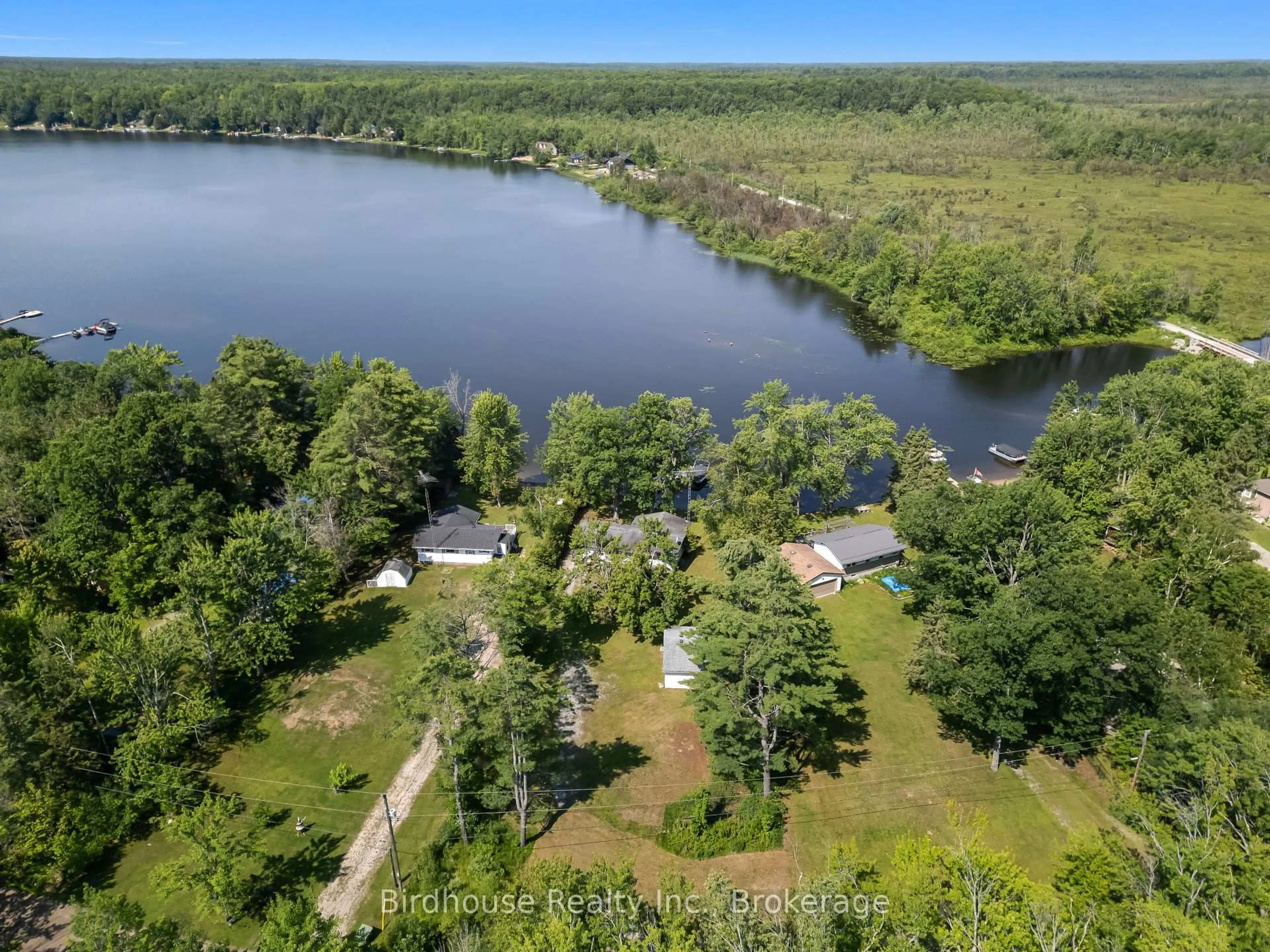 A pic from outside/outdoor area/front of a property/back of a property/a pic from drone, water/lake/river/ocean view for 210 North Shore Rd, Kawartha Lakes Ontario K0M 2B0