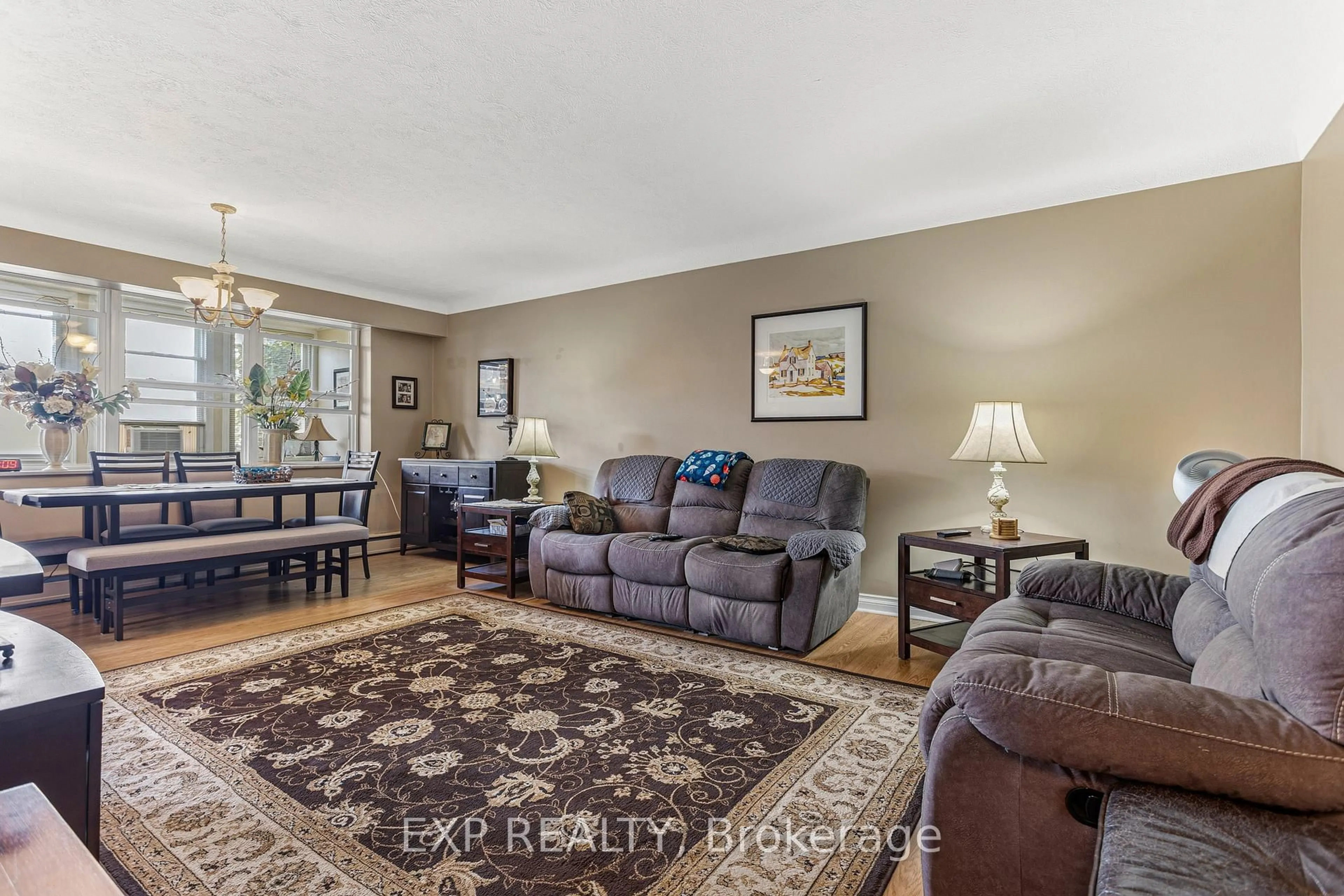 Living room with furniture, unknown for 38 Charlton Ave #302, Hamilton Ontario L8P 2C1