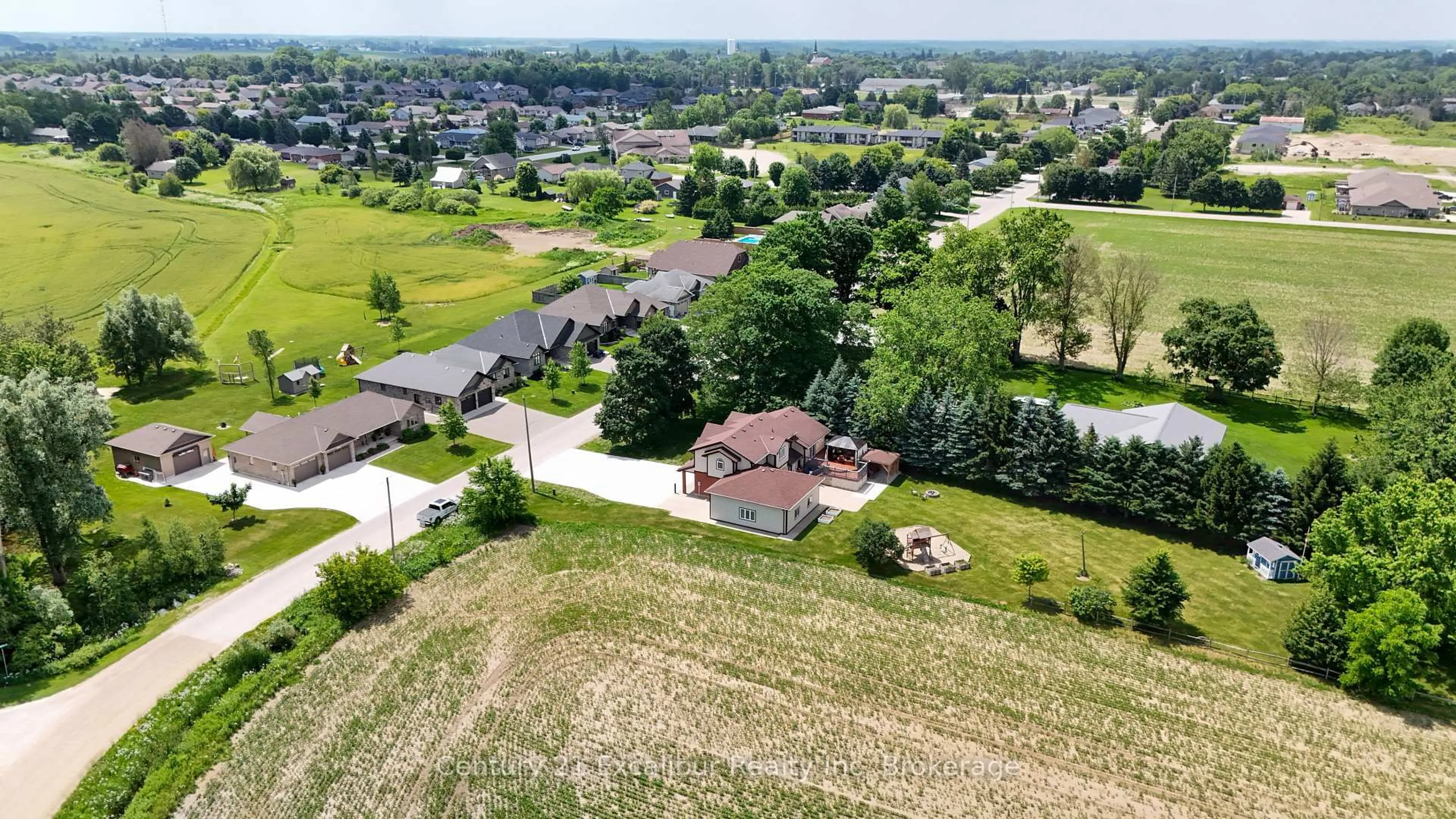 A pic from outside/outdoor area/front of a property/back of a property/a pic from drone, street for 591 Wellington St, Wellington North Ontario N0G 2L2