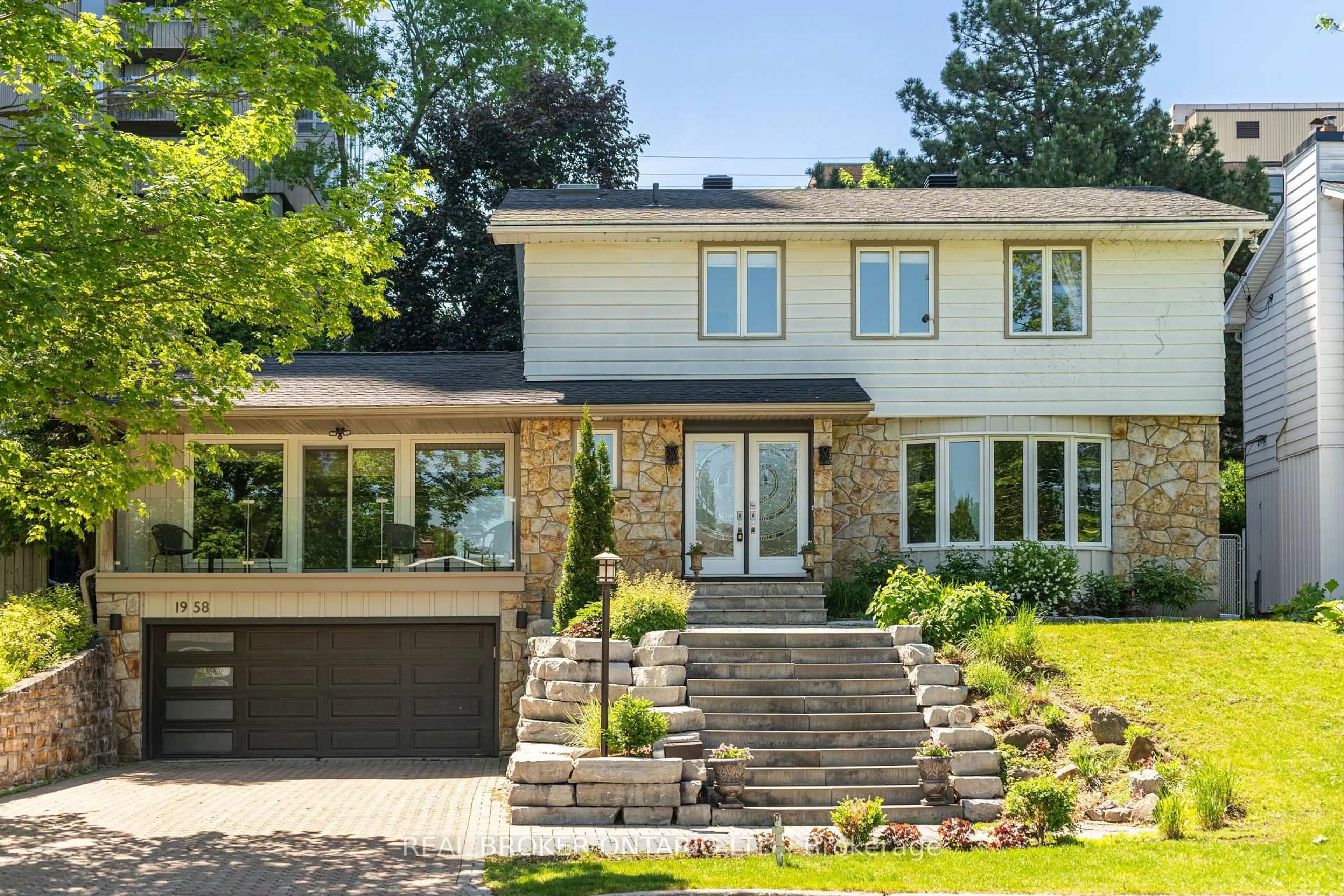 Home with brick exterior material, street for 1958 Neepawa Ave, Ottawa Ontario K2A 3L5