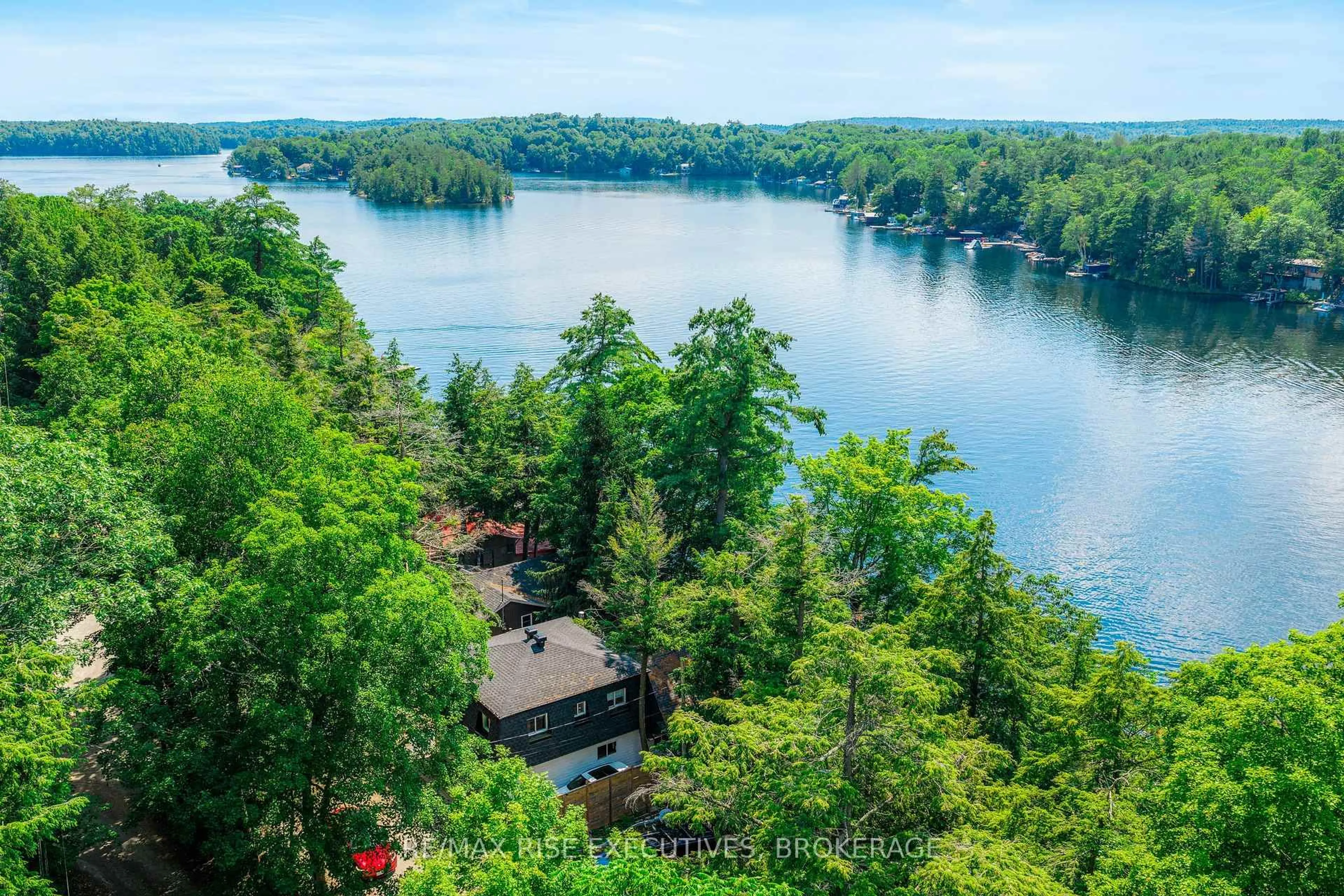 A pic from outside/outdoor area/front of a property/back of a property/a pic from drone, water/lake/river/ocean view for 973 Foster Bay Lane, Leeds and the Thousand Islands Ontario K0E 1B0