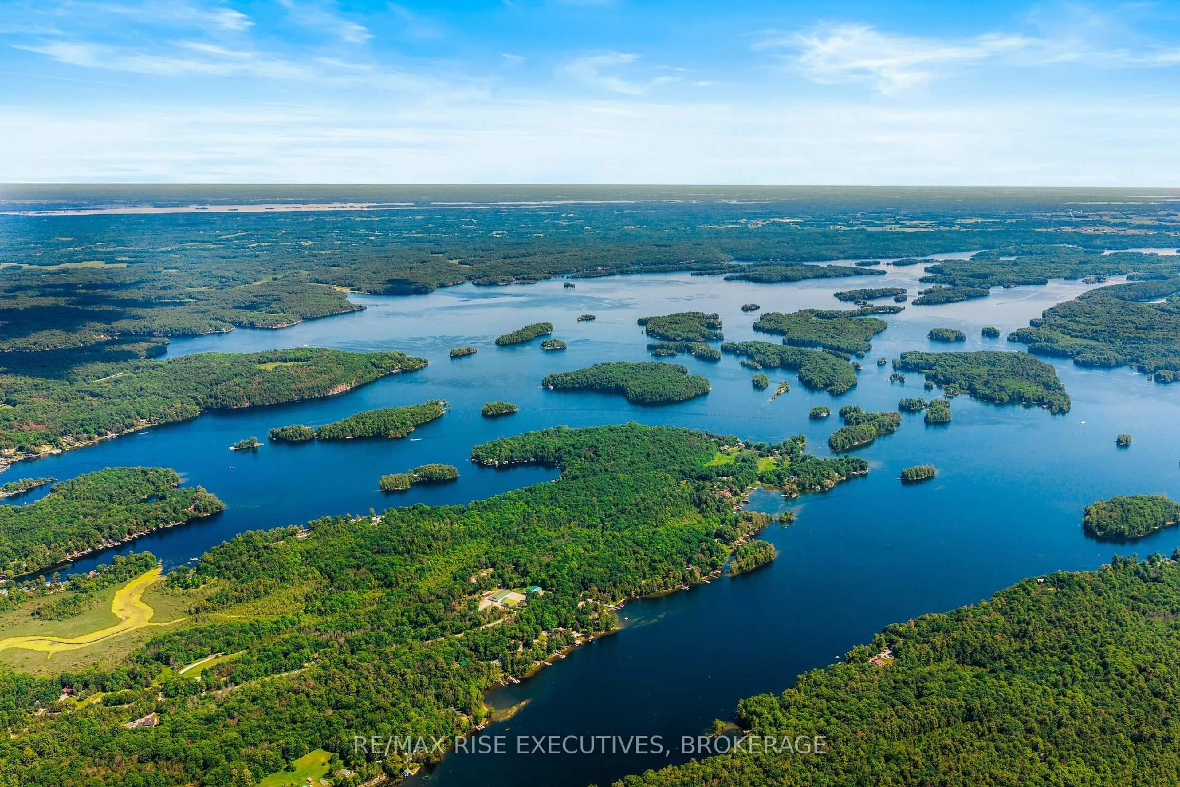 A pic from outside/outdoor area/front of a property/back of a property/a pic from drone, water/lake/river/ocean view for 973 Foster Bay Lane, Leeds and the Thousand Islands Ontario K0E 1B0