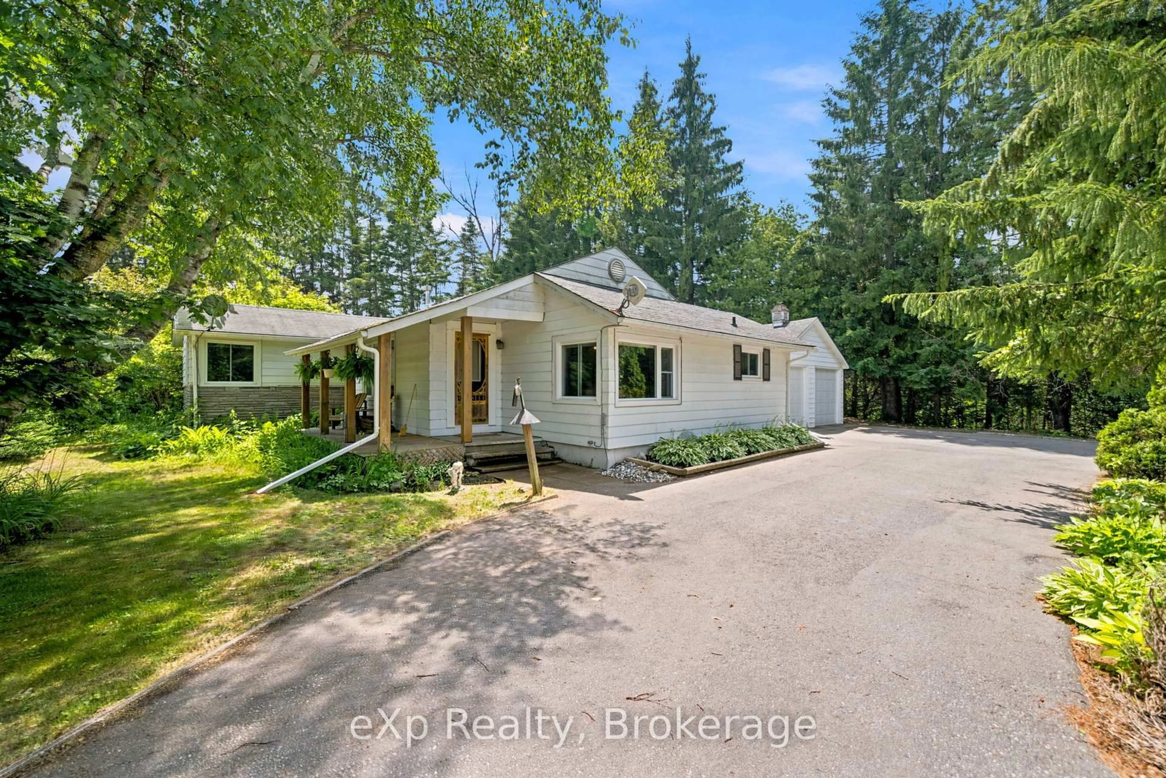 A pic from outside/outdoor area/front of a property/back of a property/a pic from drone, water/lake/river/ocean view for 2002 County Rd 22, Cramahe Ontario K0K 1M0