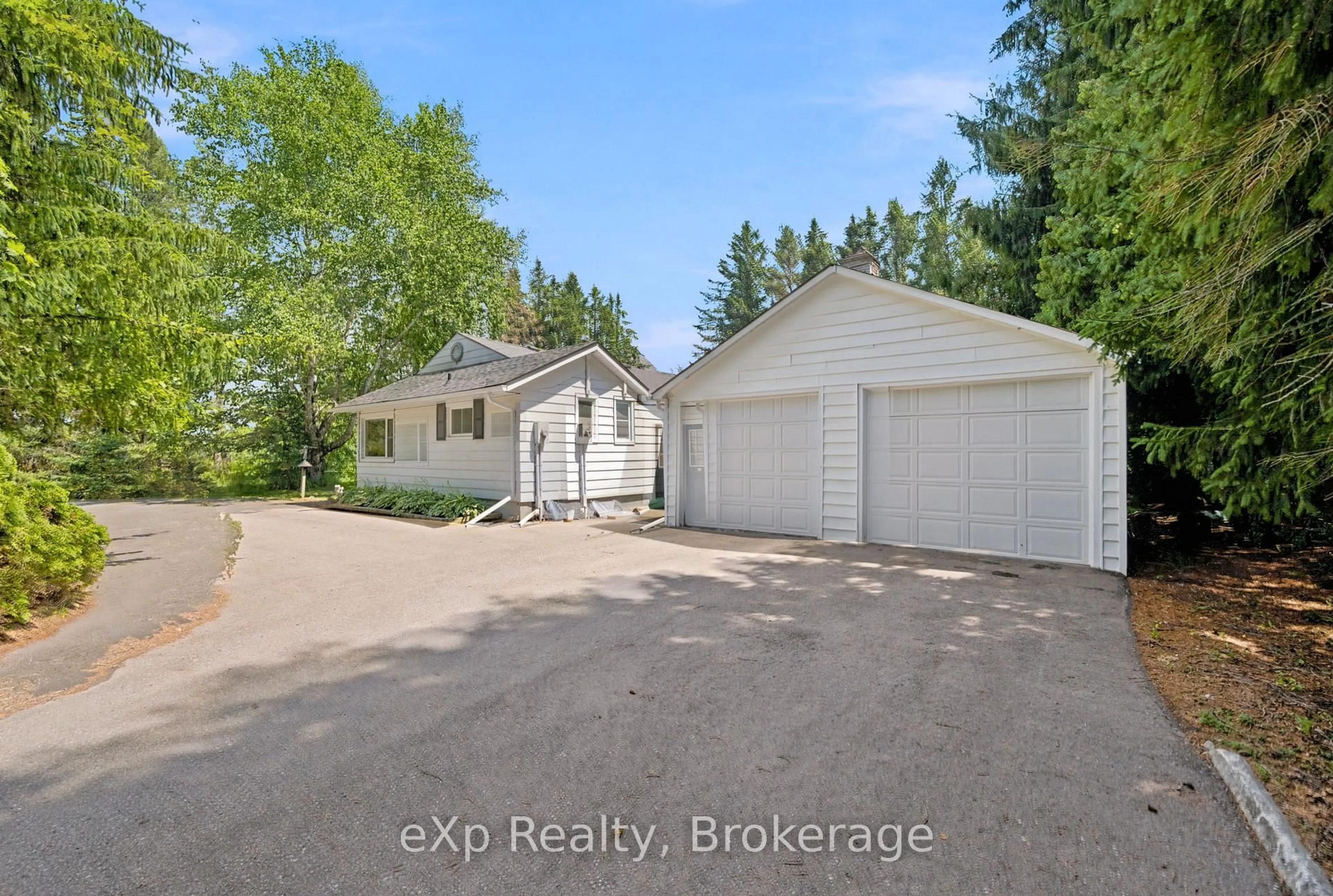 A pic from outside/outdoor area/front of a property/back of a property/a pic from drone, water/lake/river/ocean view for 2002 County Rd 22, Cramahe Ontario K0K 1M0