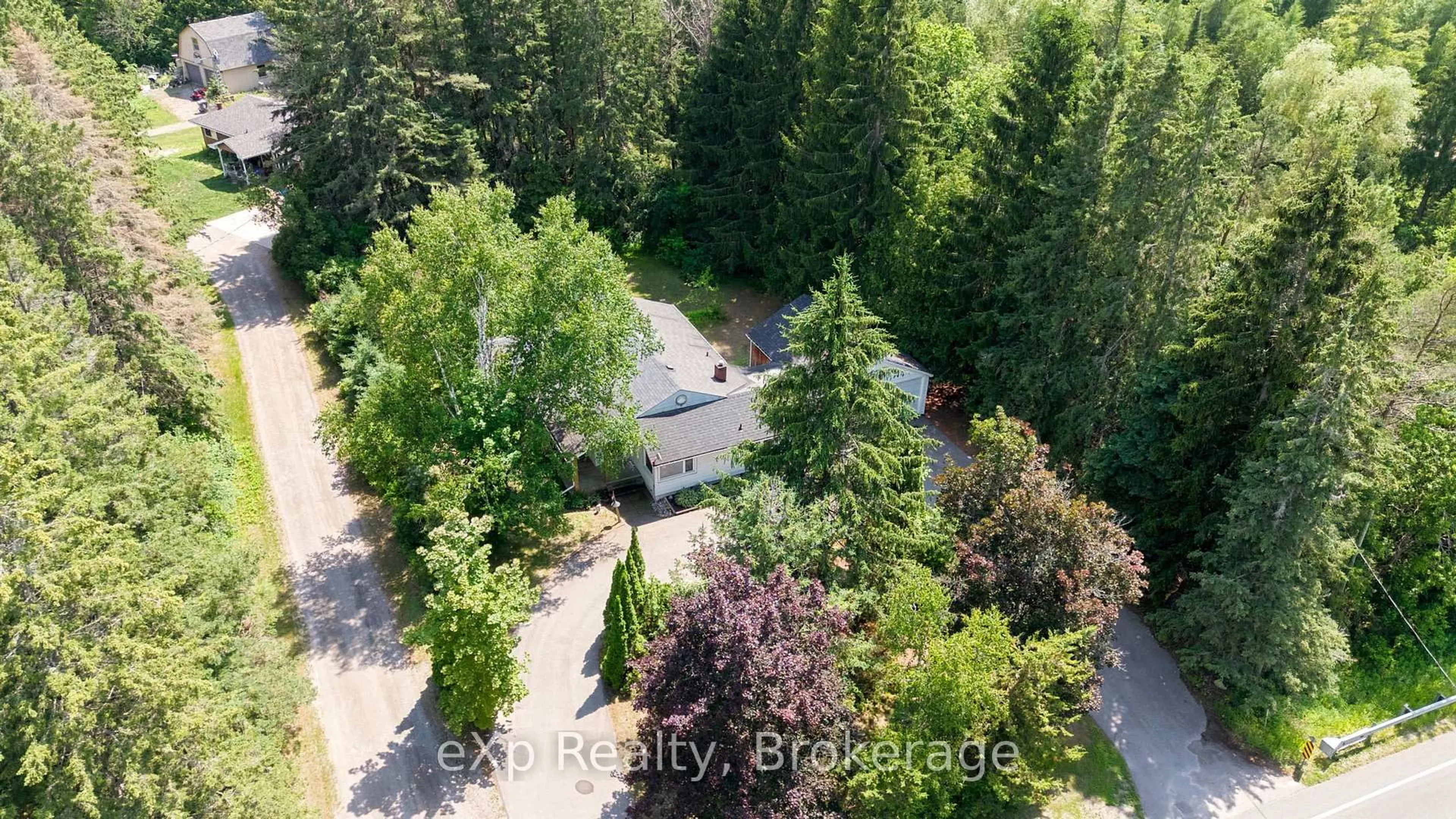 A pic from outside/outdoor area/front of a property/back of a property/a pic from drone, forest/trees view for 2002 County Rd 22, Cramahe Ontario K0K 1M0