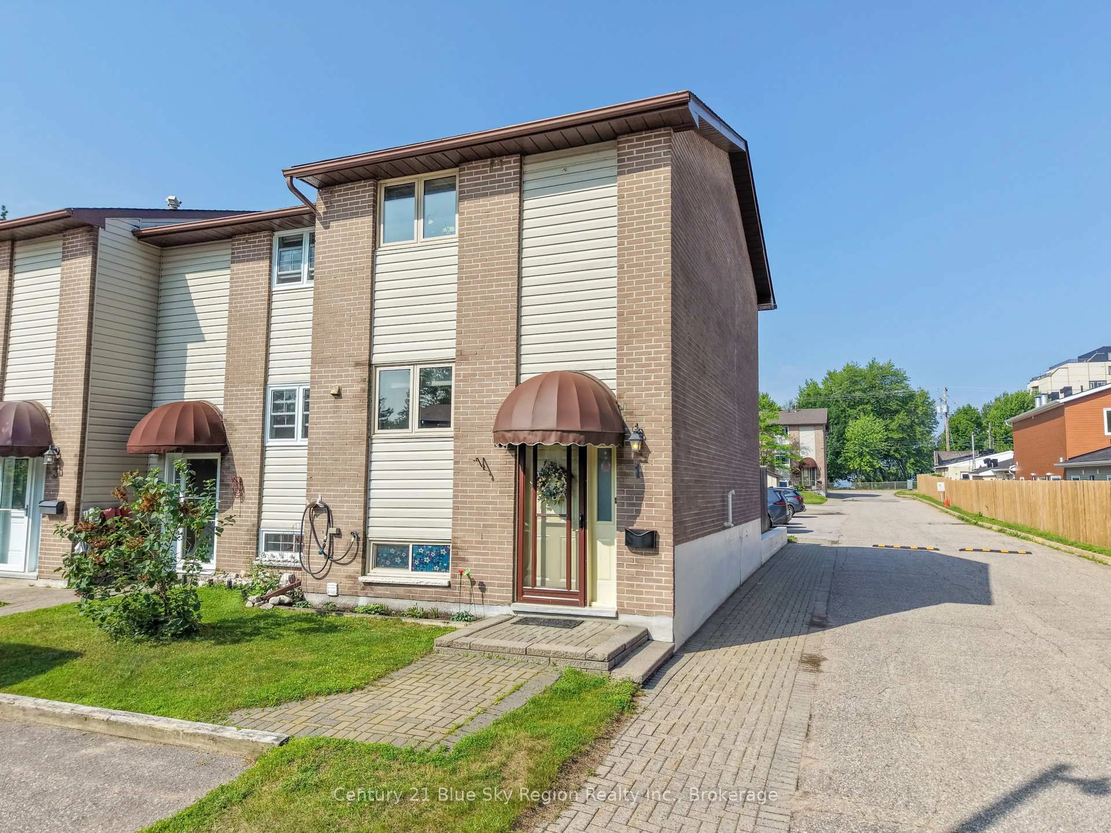 Home with brick exterior material, street for 450 Lakeshore Dr #C1, North Bay Ontario P1A 2E1