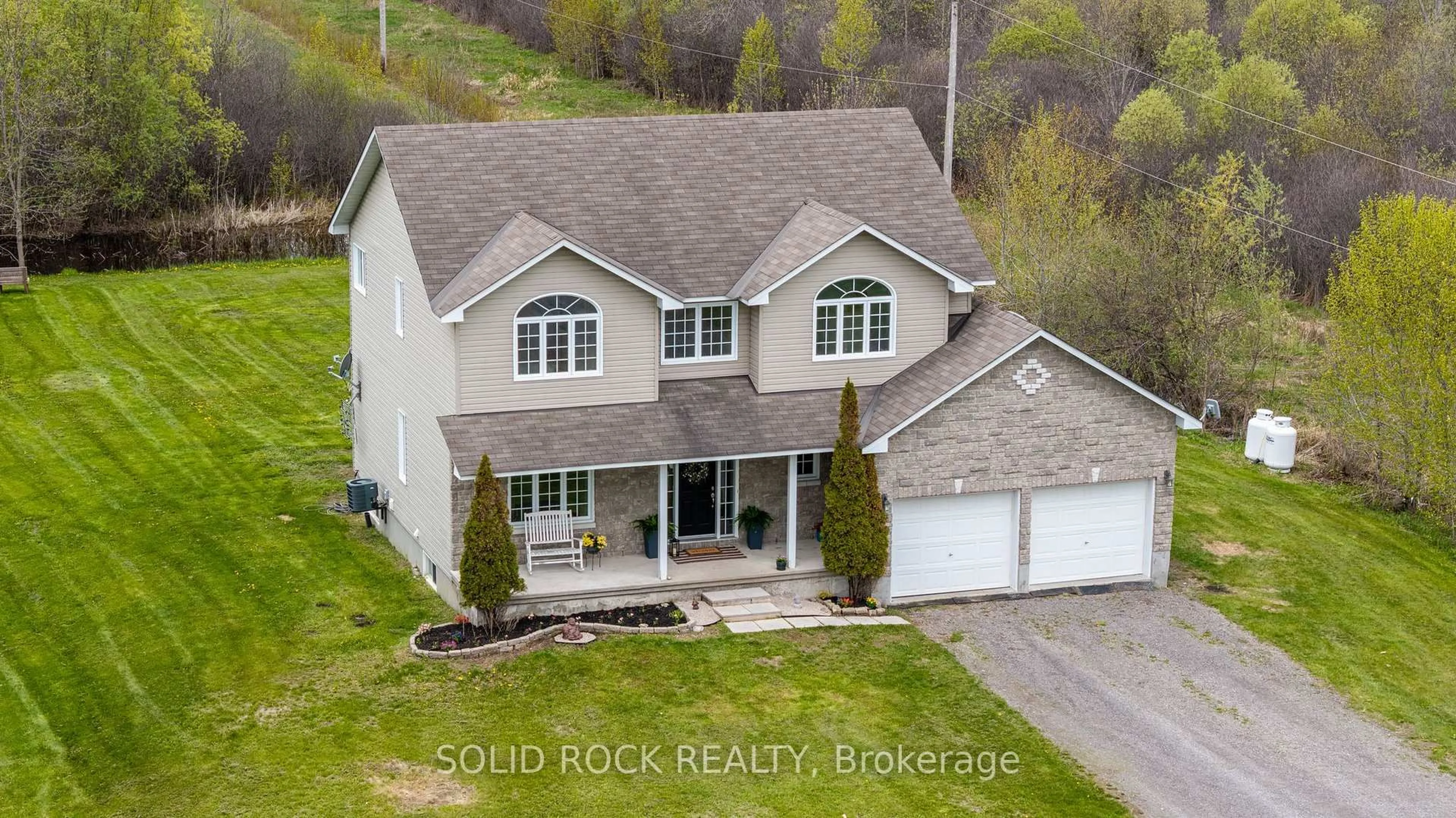 A pic from outside/outdoor area/front of a property/back of a property/a pic from drone, unknown for 4230 Gordon Murdock Rd, Osgoode Ontario K0A 2W0