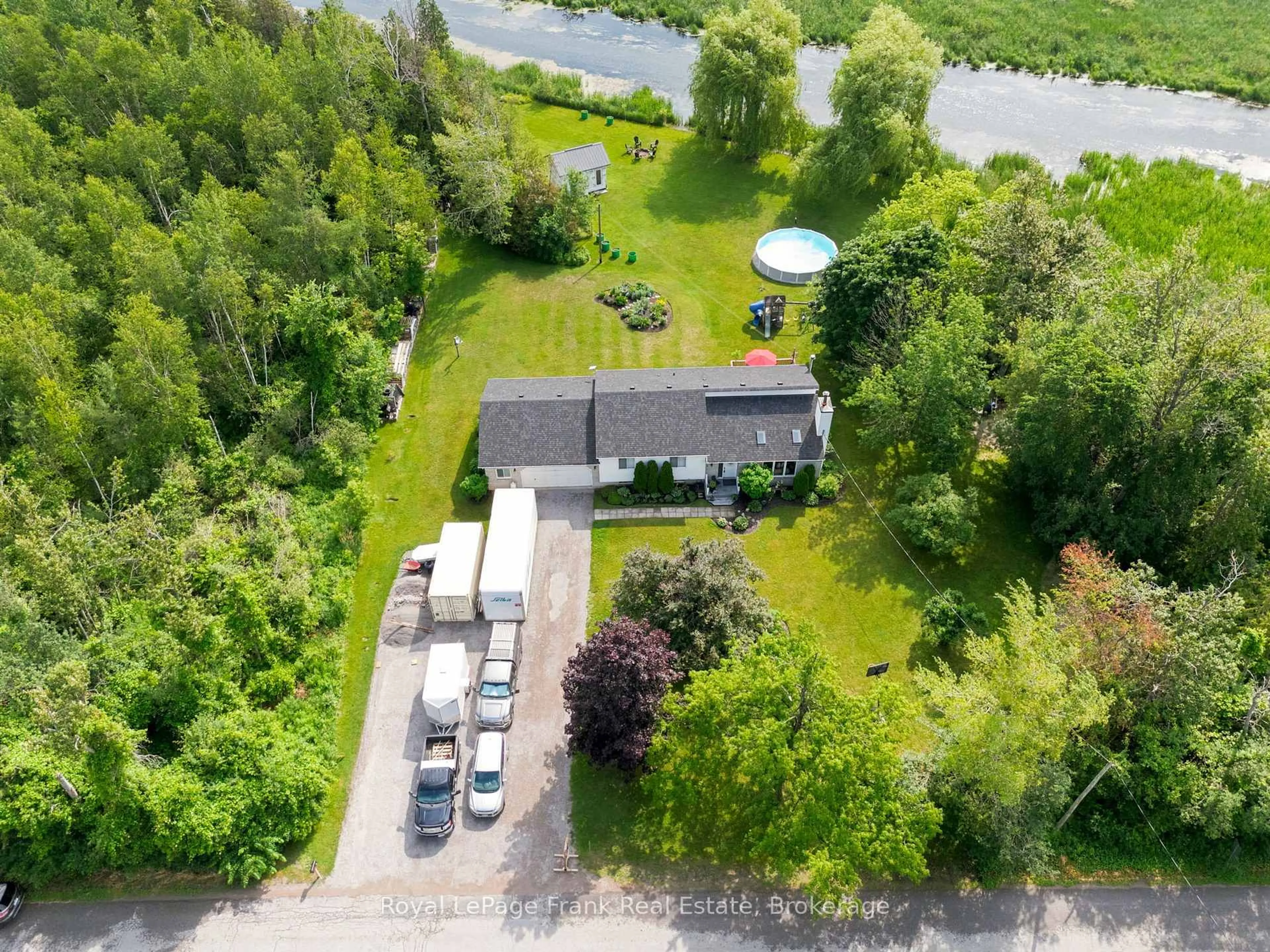 A pic from outside/outdoor area/front of a property/back of a property/a pic from drone, unknown for 128 River Rd, Kawartha Lakes Ontario K9V 4R4