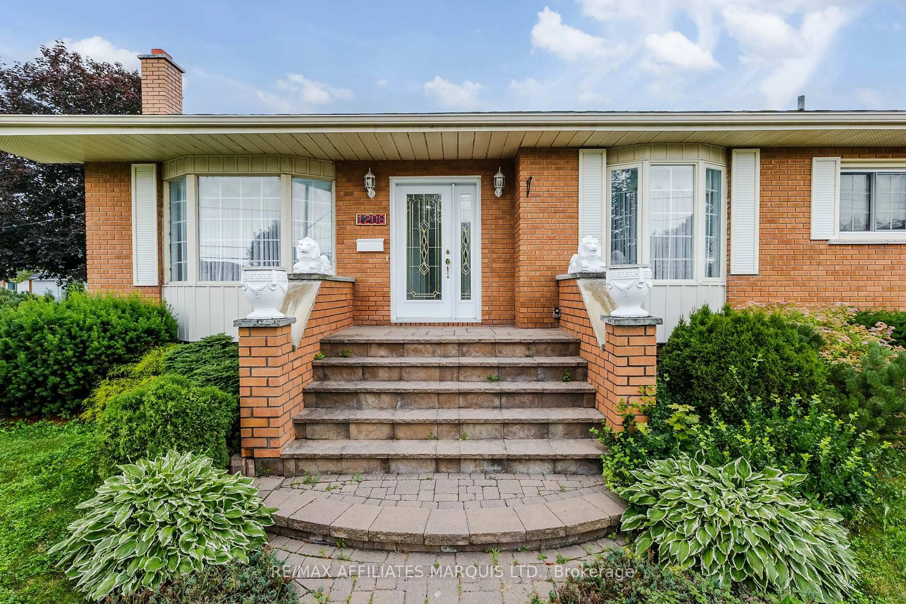 Home with brick exterior material, street for 1208 Third St, Cornwall Ontario K6H 2G2