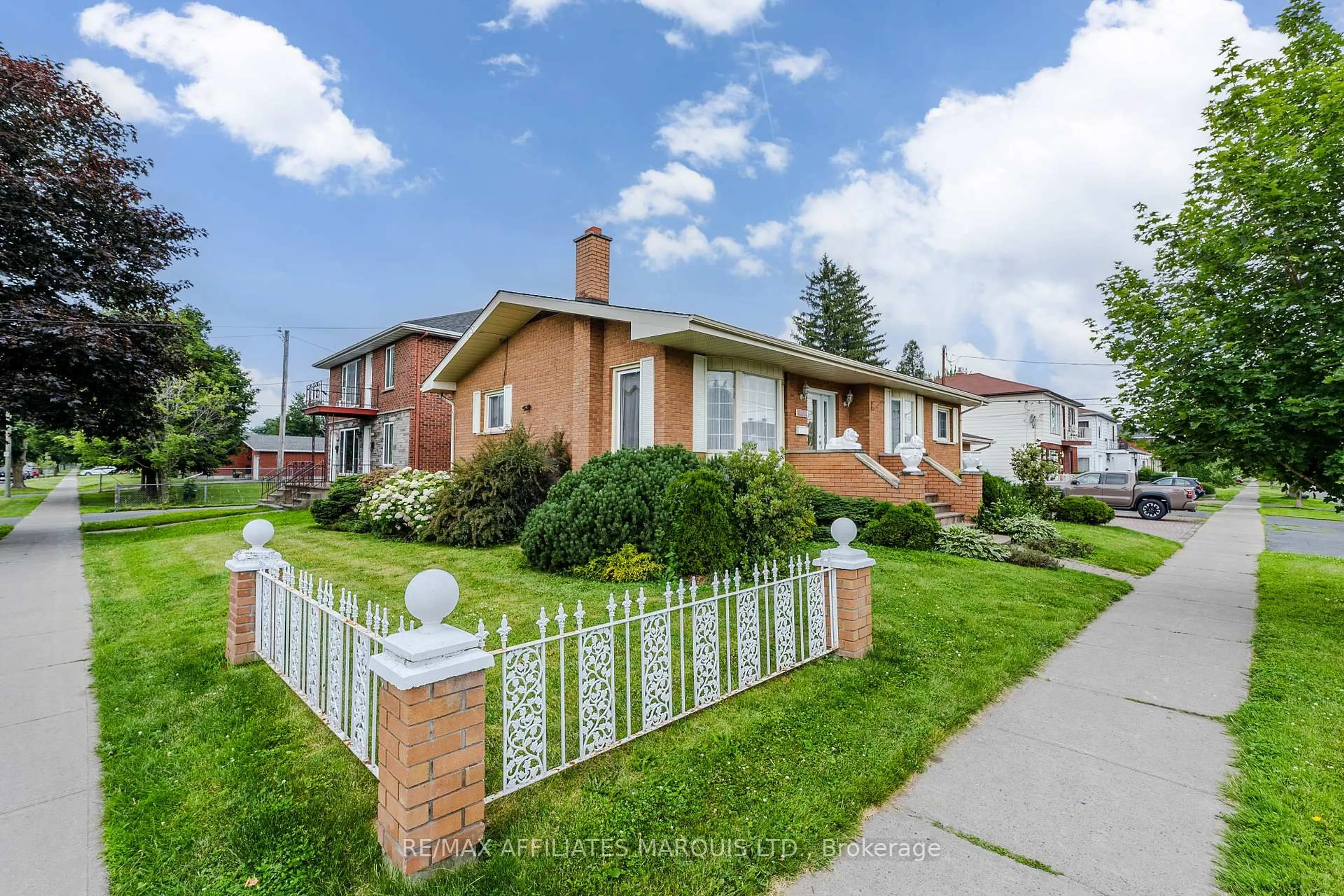Home with brick exterior material, street for 1208 Third St, Cornwall Ontario K6H 2G2