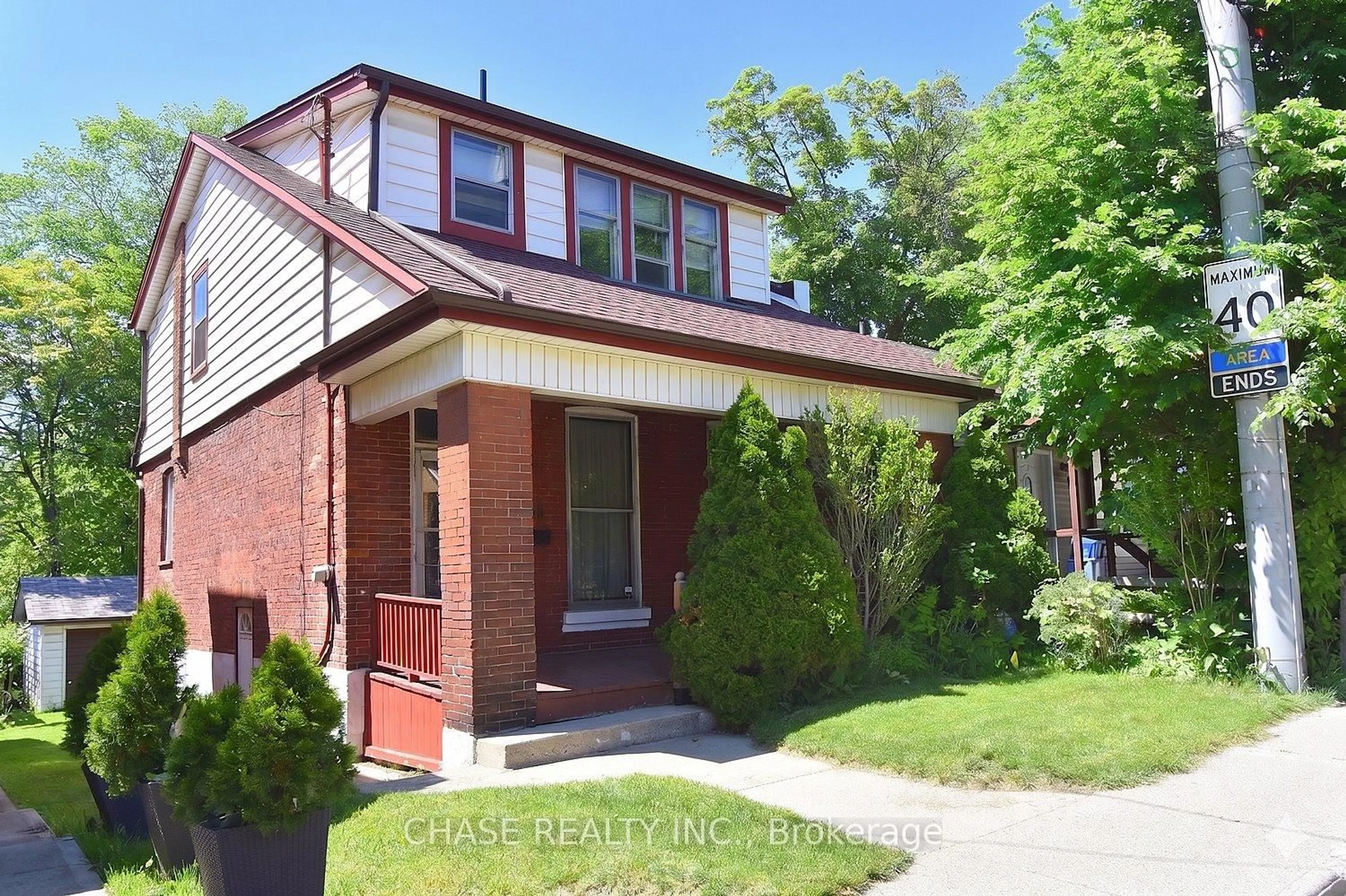 Home with brick exterior material, street for 70 Ray St, Hamilton Ontario L8P 3V6