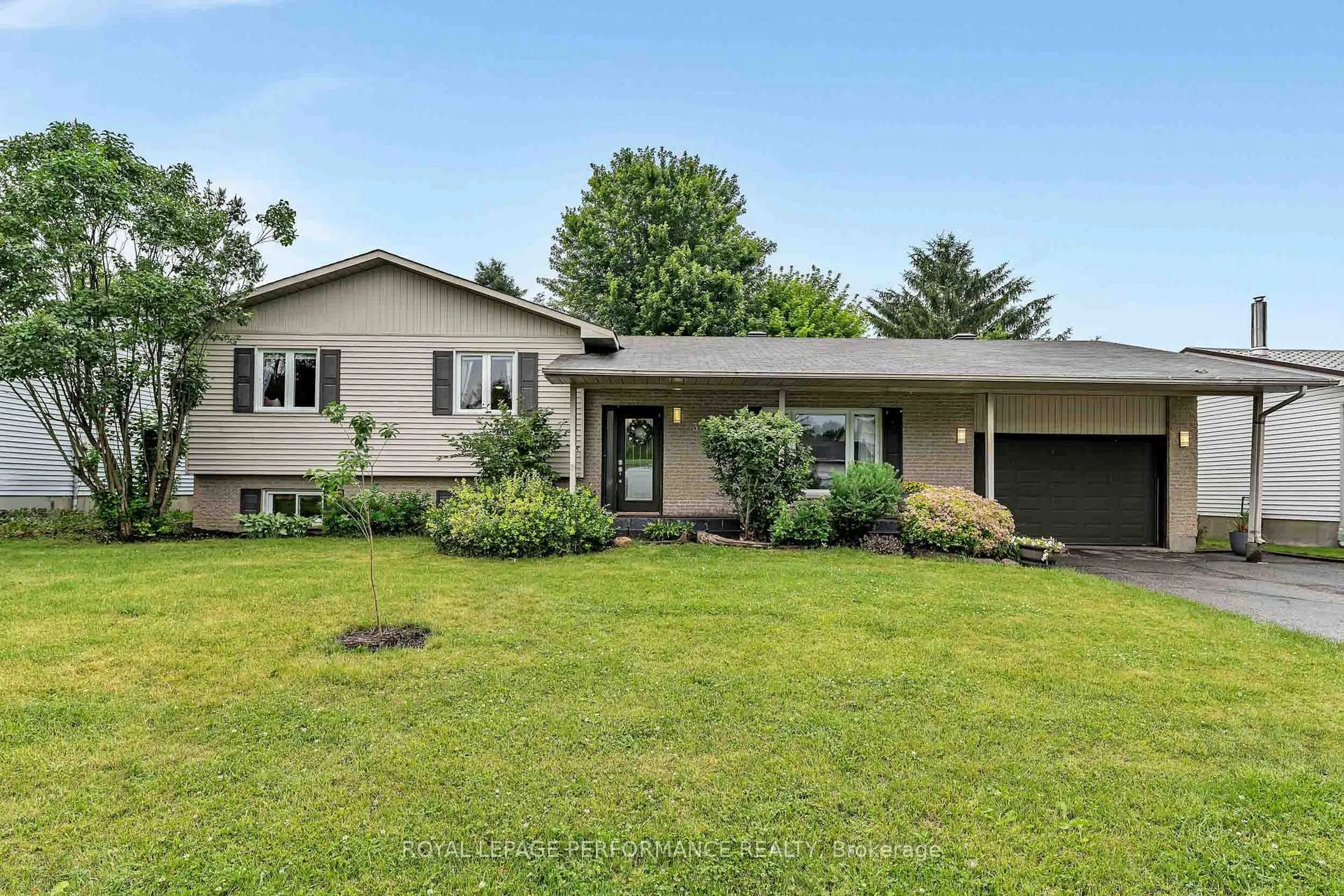 Home with vinyl exterior material, street for 30 Promenade Blvd, Russell Ontario K0A 1W1