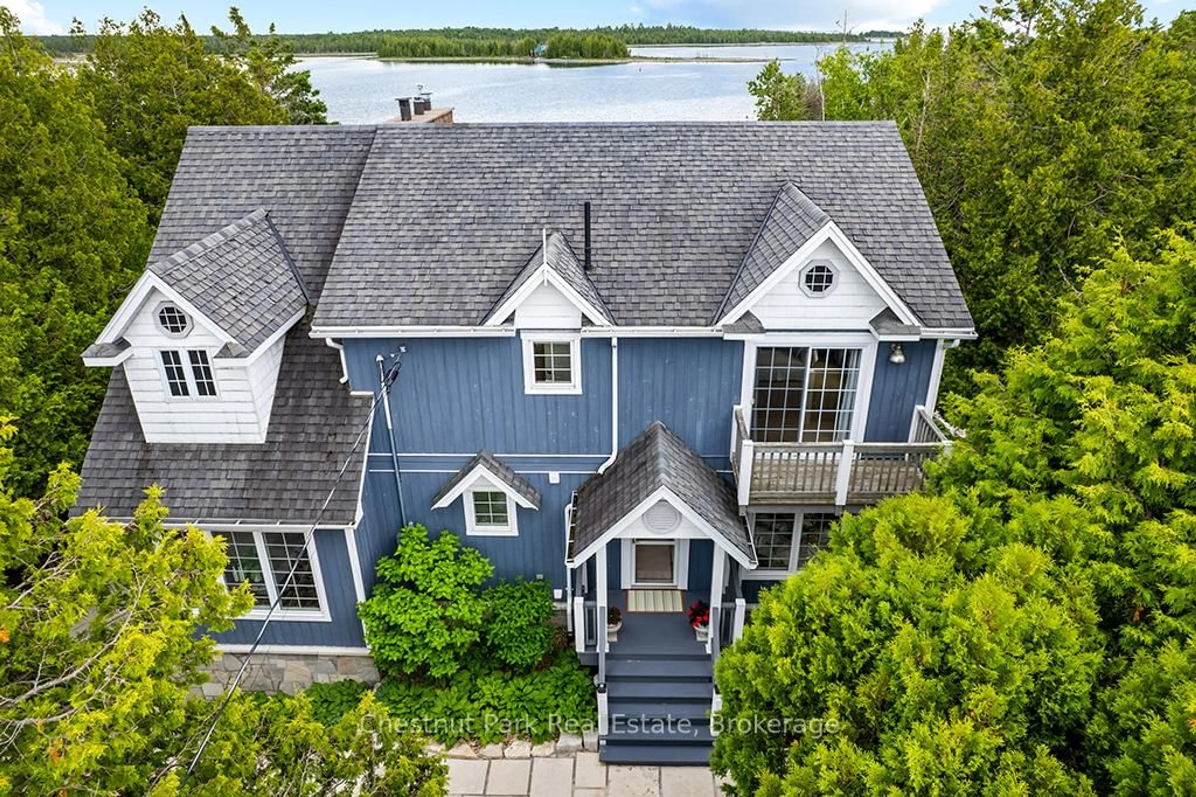 A pic from outside/outdoor area/front of a property/back of a property/a pic from drone, water/lake/river/ocean view for 127 Pine Tree Harbour Rd, Northern Bruce Peninsula Ontario N0H 1Z0