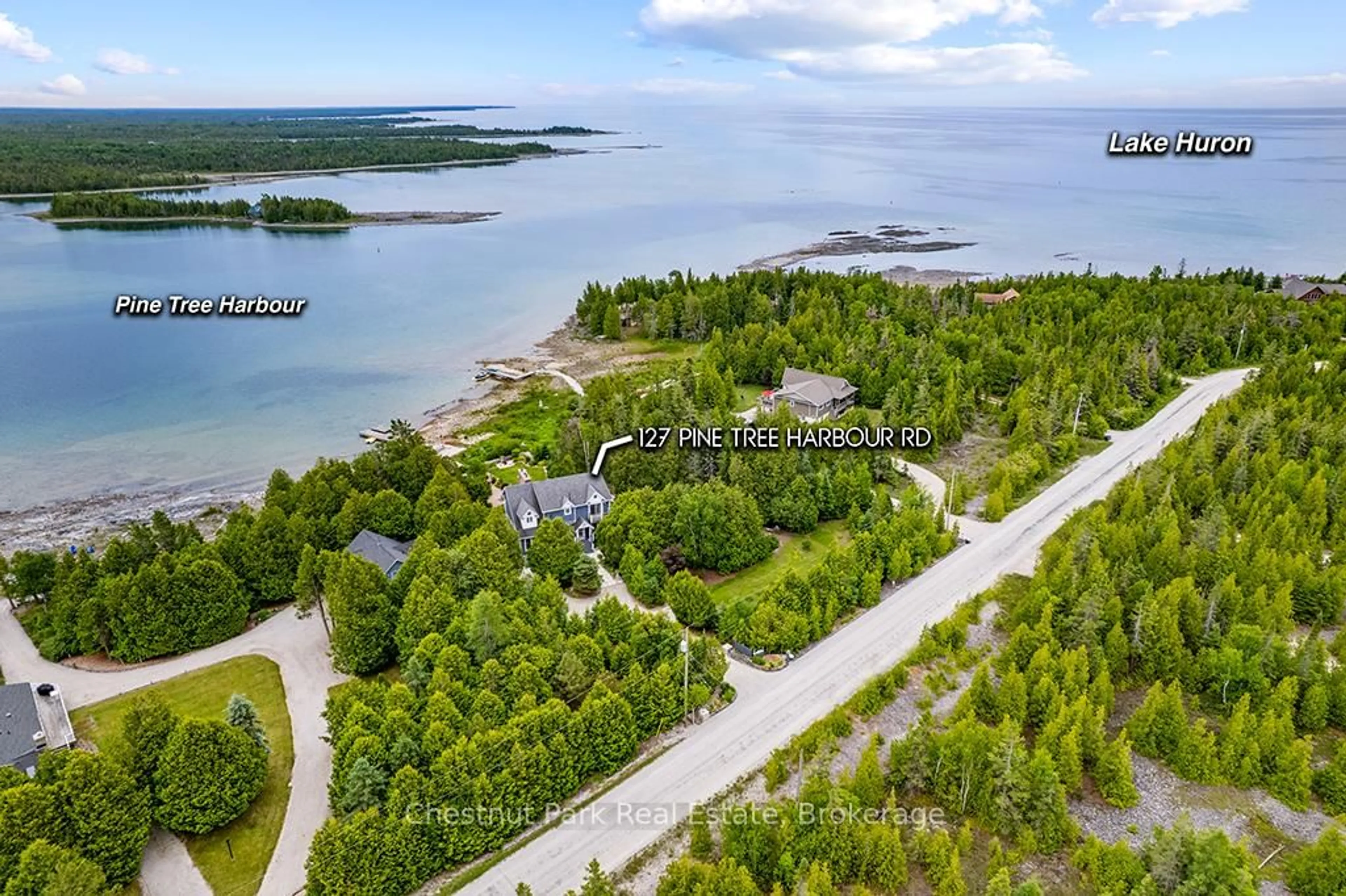 A pic from outside/outdoor area/front of a property/back of a property/a pic from drone, water/lake/river/ocean view for 127 Pine Tree Harbour Rd, Northern Bruce Peninsula Ontario N0H 1Z0