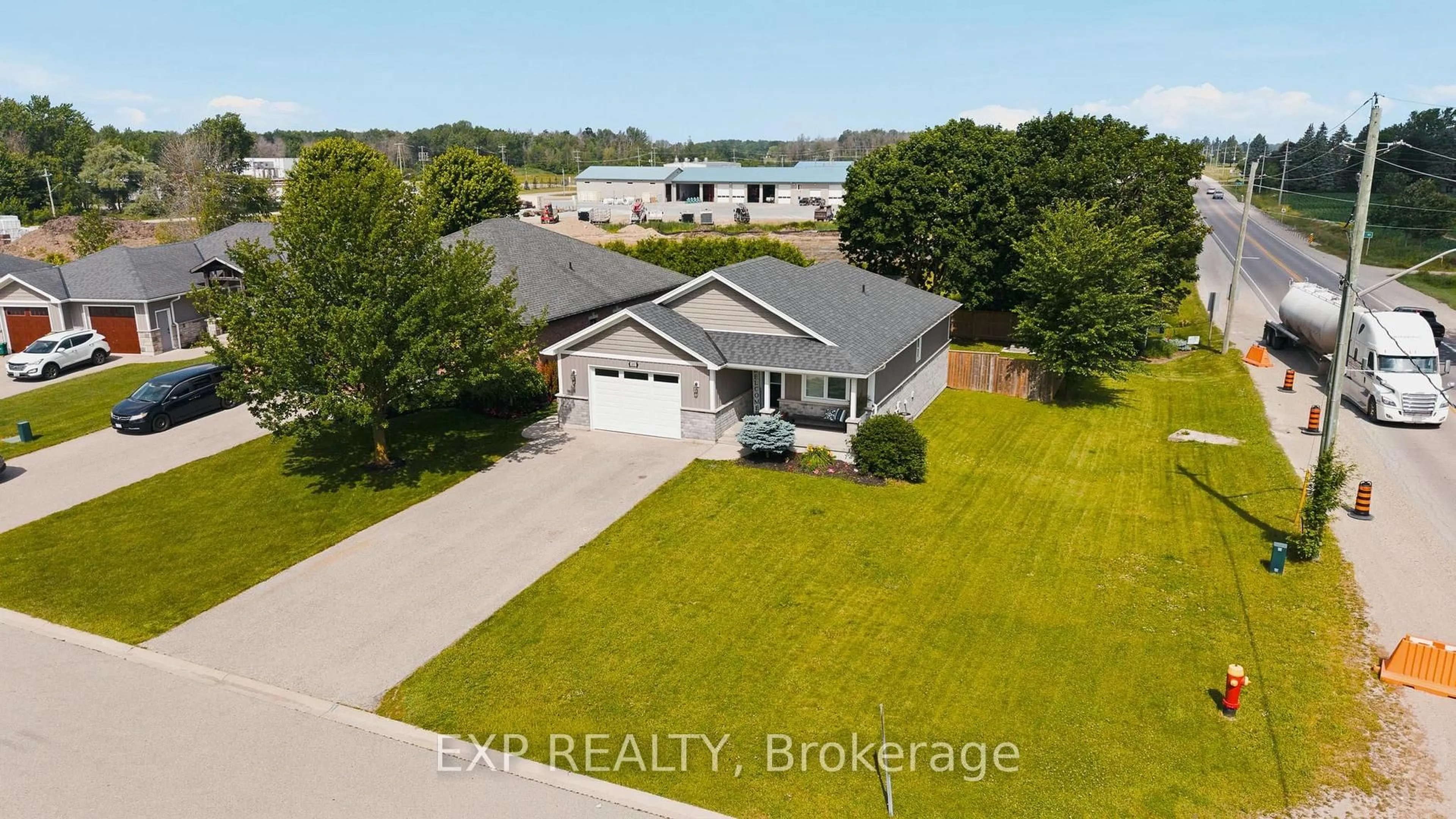 A pic from outside/outdoor area/front of a property/back of a property/a pic from drone, water/lake/river/ocean view for 101 Tuffy MacDougall Crt, Minto Ontario N0G 1Z0
