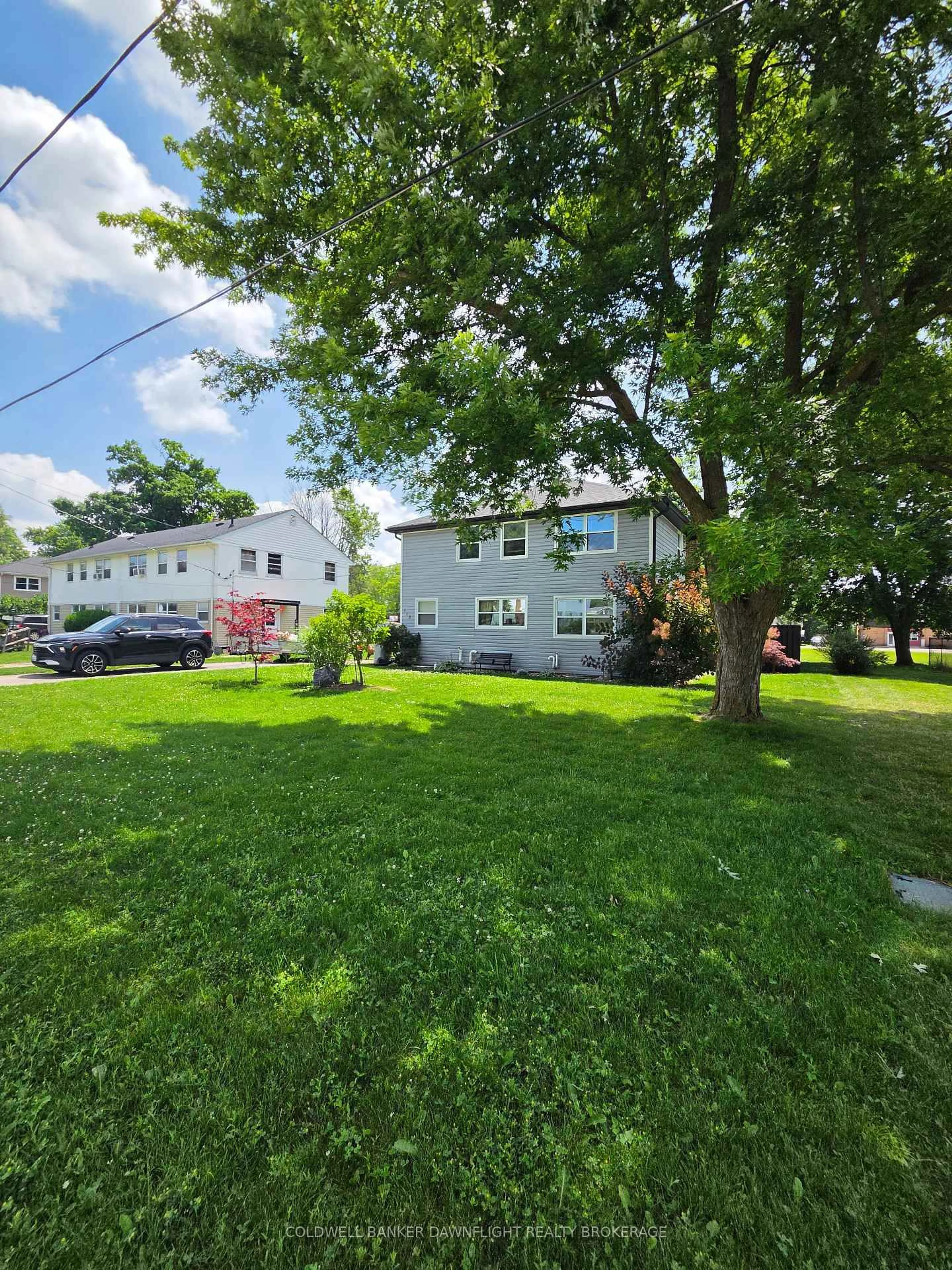 A pic from outside/outdoor area/front of a property/back of a property/a pic from drone, street for 115 Columbia Dr, South Huron Ontario N0M 1Y0