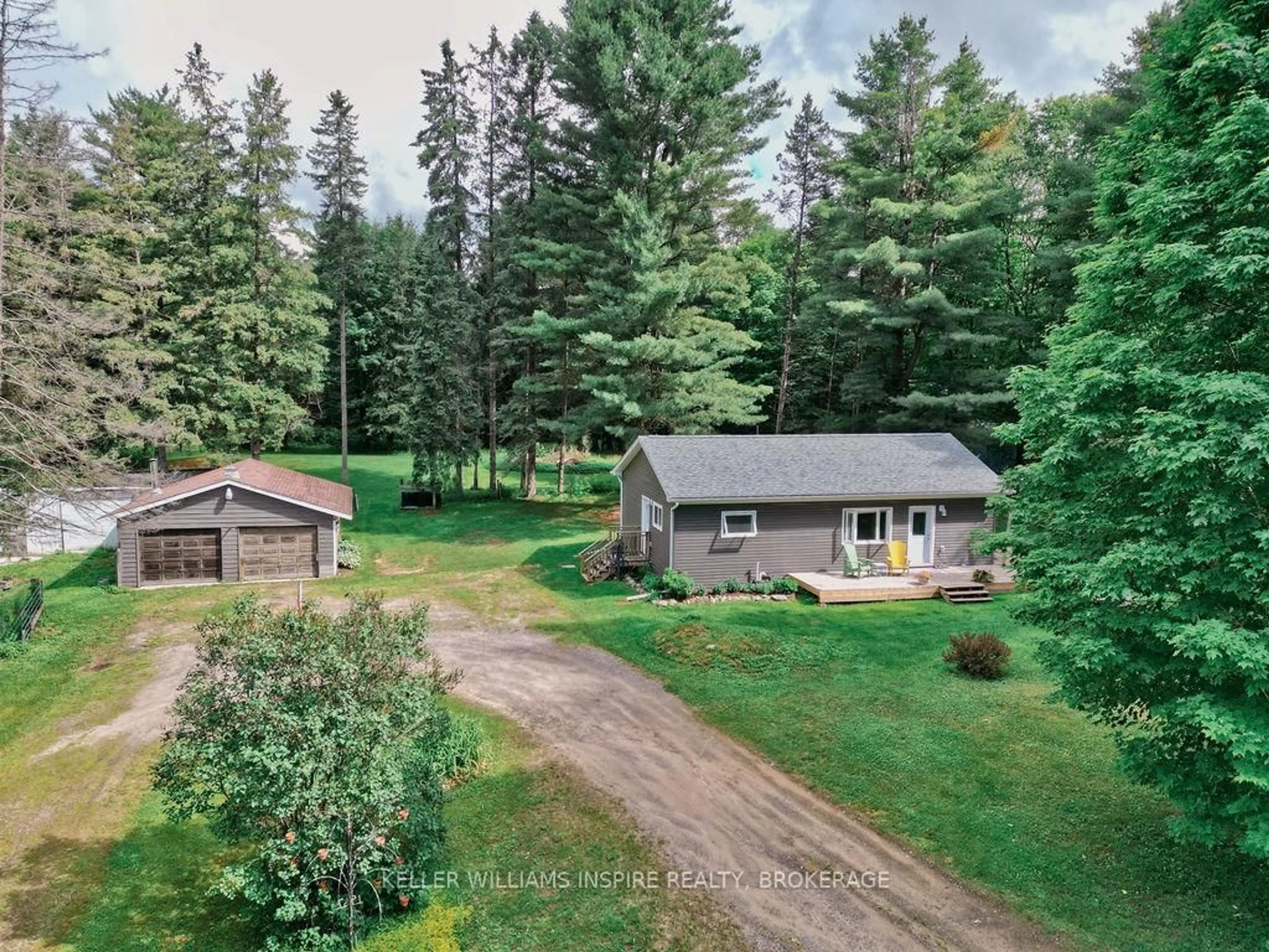 A pic from outside/outdoor area/front of a property/back of a property/a pic from drone, forest/trees view for 2352 Highway 518 W, McMurrich/Monteith Ontario P0A 1Y0