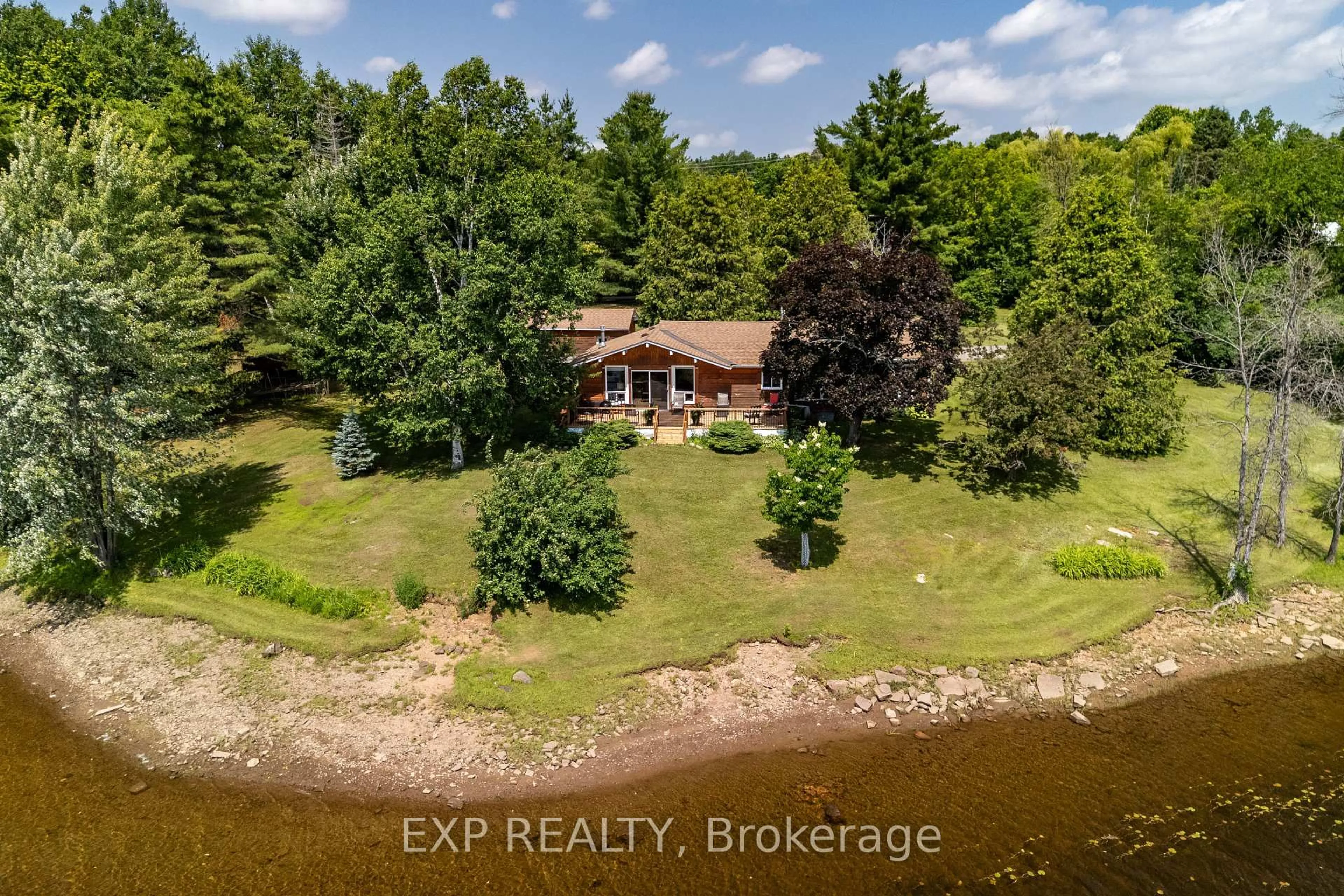 A pic from outside/outdoor area/front of a property/back of a property/a pic from drone, water/lake/river/ocean view for 35 Downing Lane, Calabogie Ontario K0J 1H0