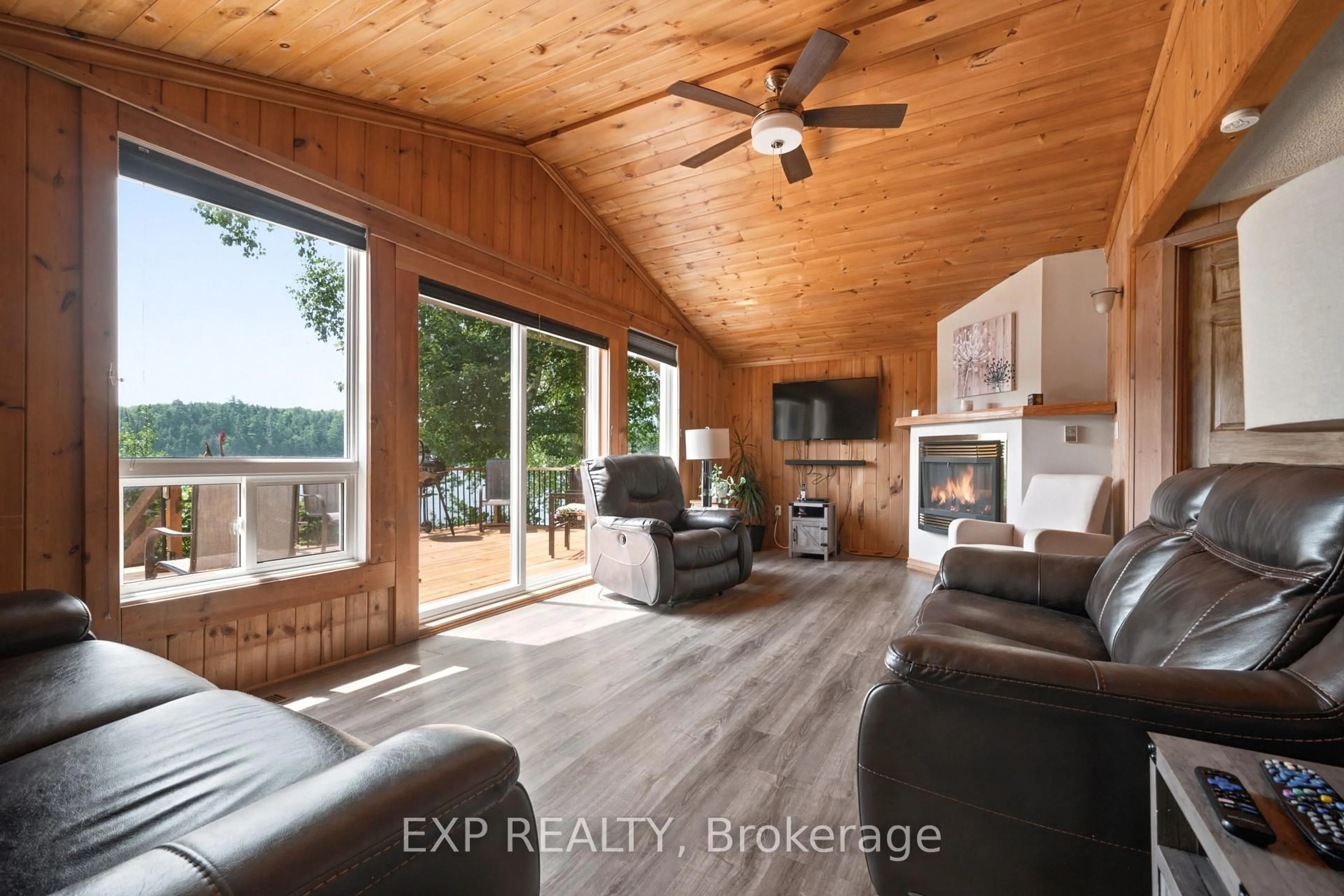 Living room with furniture, wood/laminate floor for 35 Downing Lane, Calabogie Ontario K0J 1H0