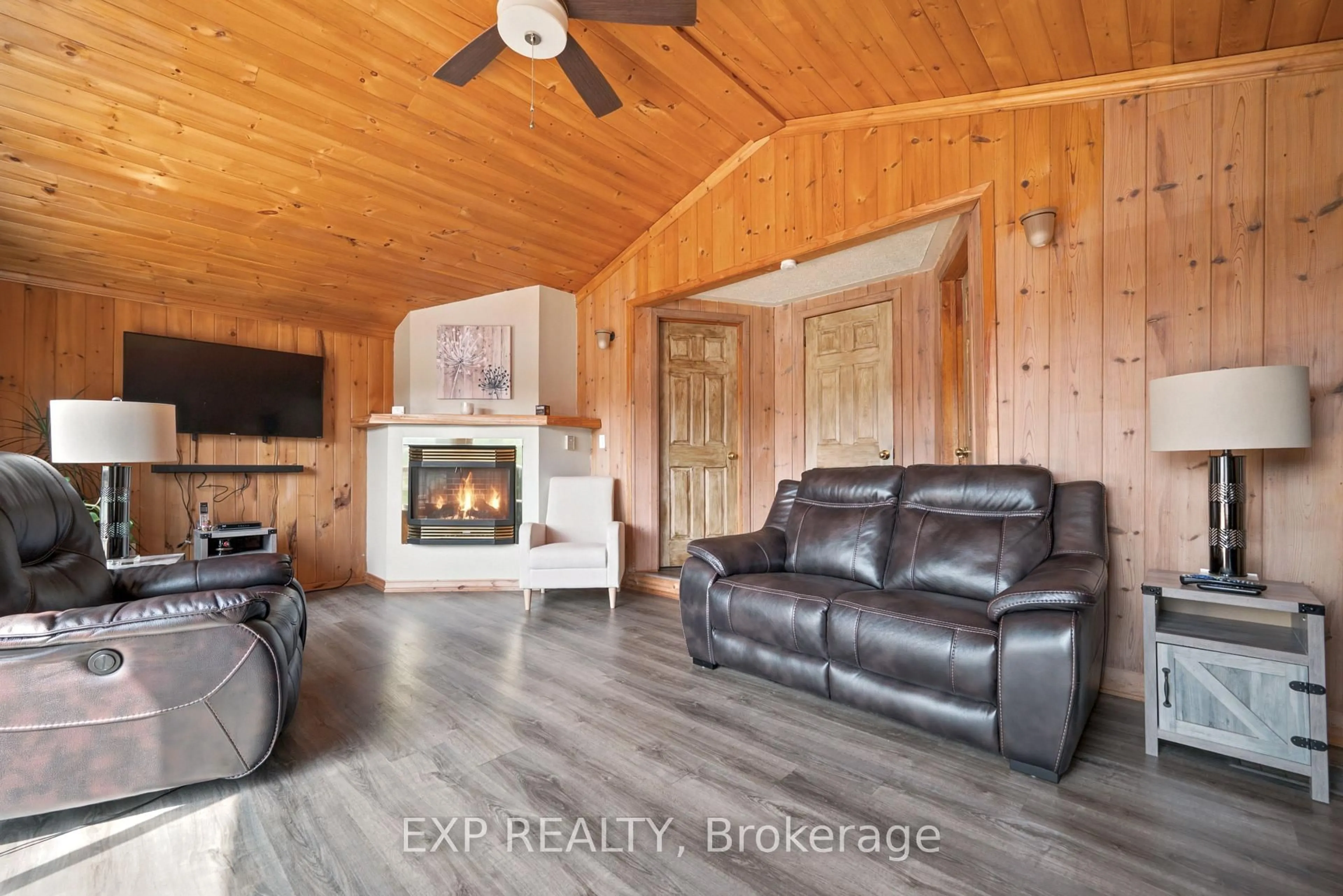 Living room with furniture, wood/laminate floor for 35 Downing Lane, Calabogie Ontario K0J 1H0