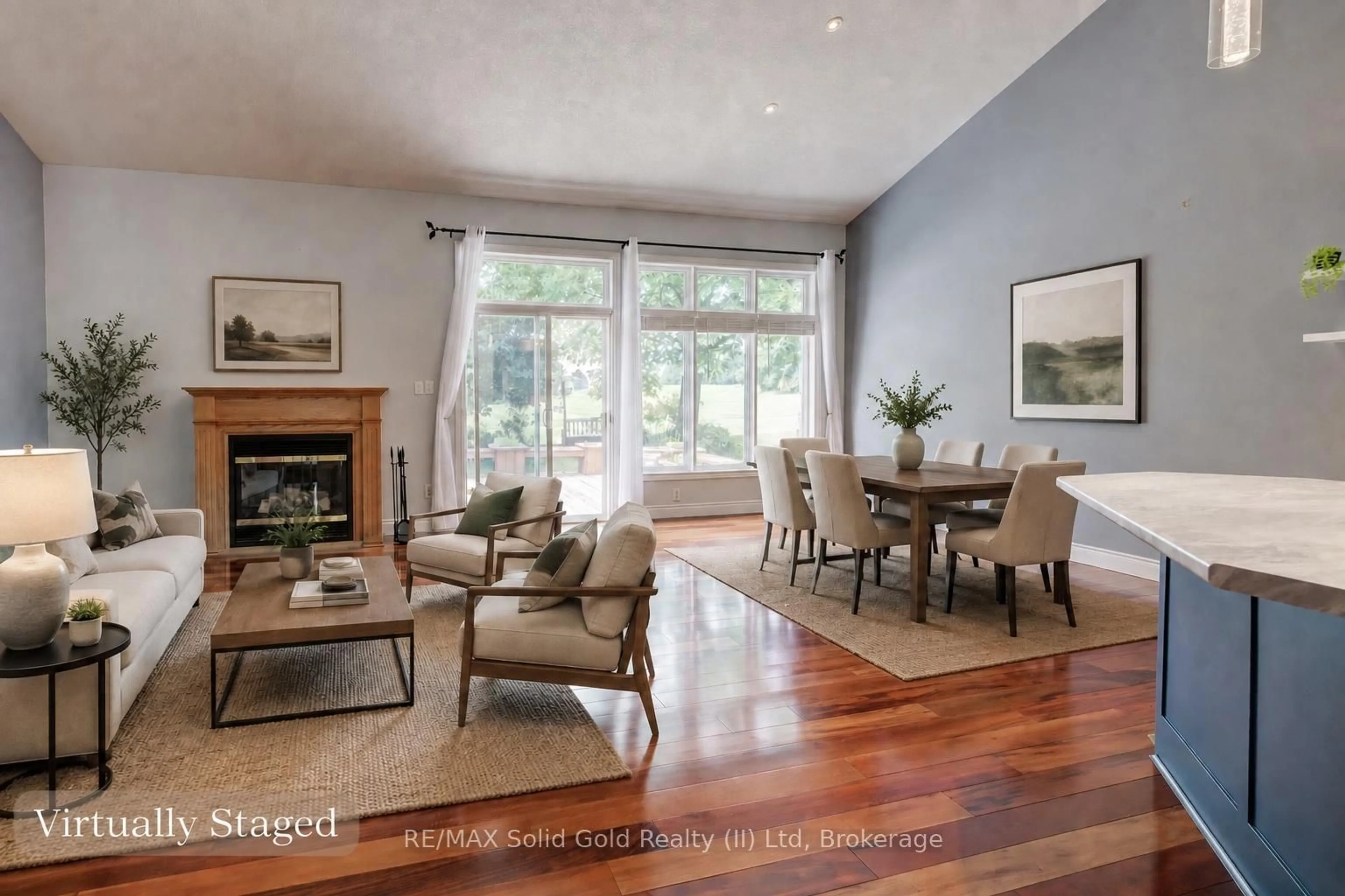 Living room with furniture, wood/laminate floor for 11 Sun Valley Dr, Wilmot Ontario N3A 3P8