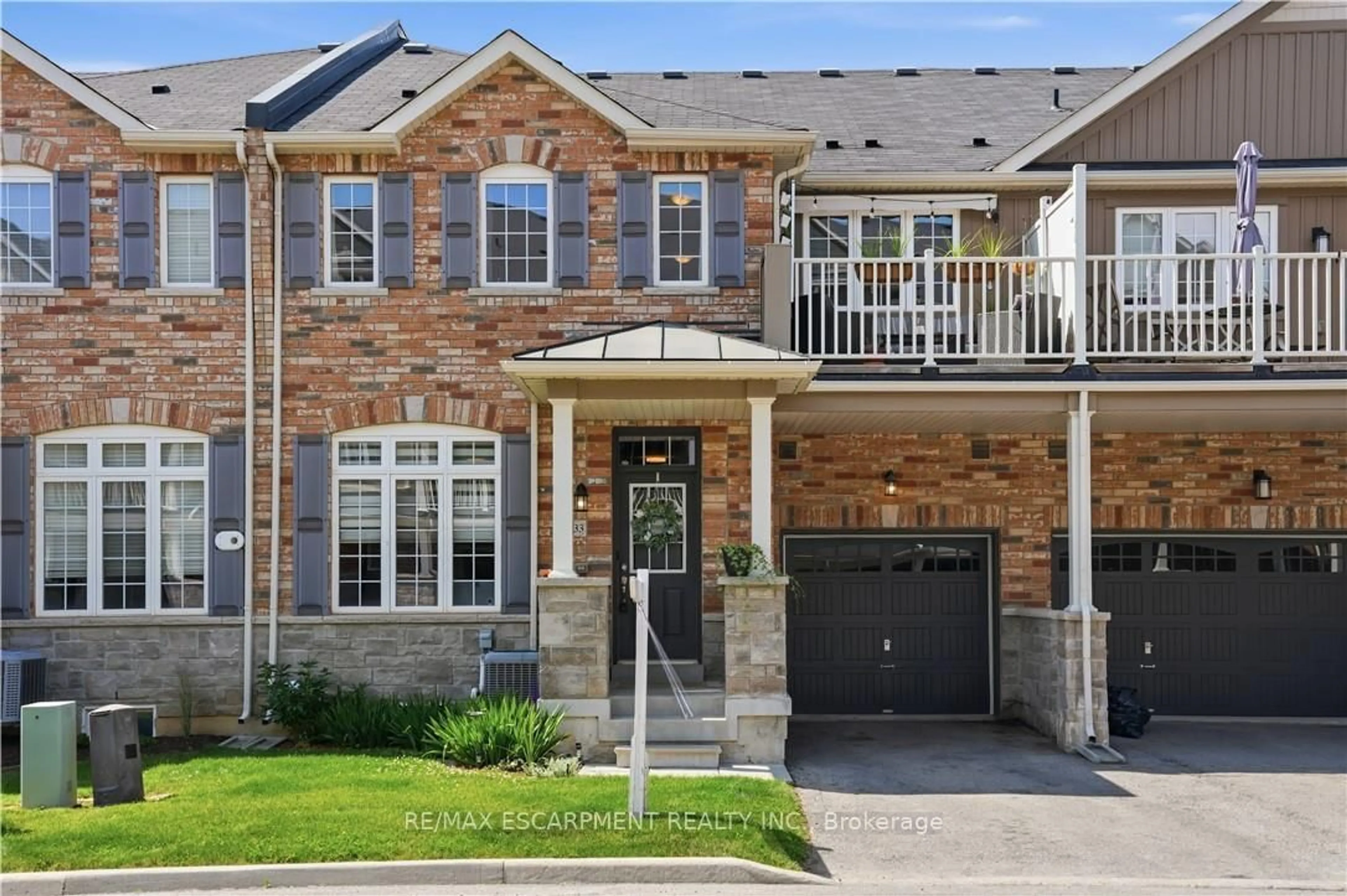 Home with brick exterior material, street for 54 NISBET Blvd #33, Hamilton Ontario L8B 0Y3