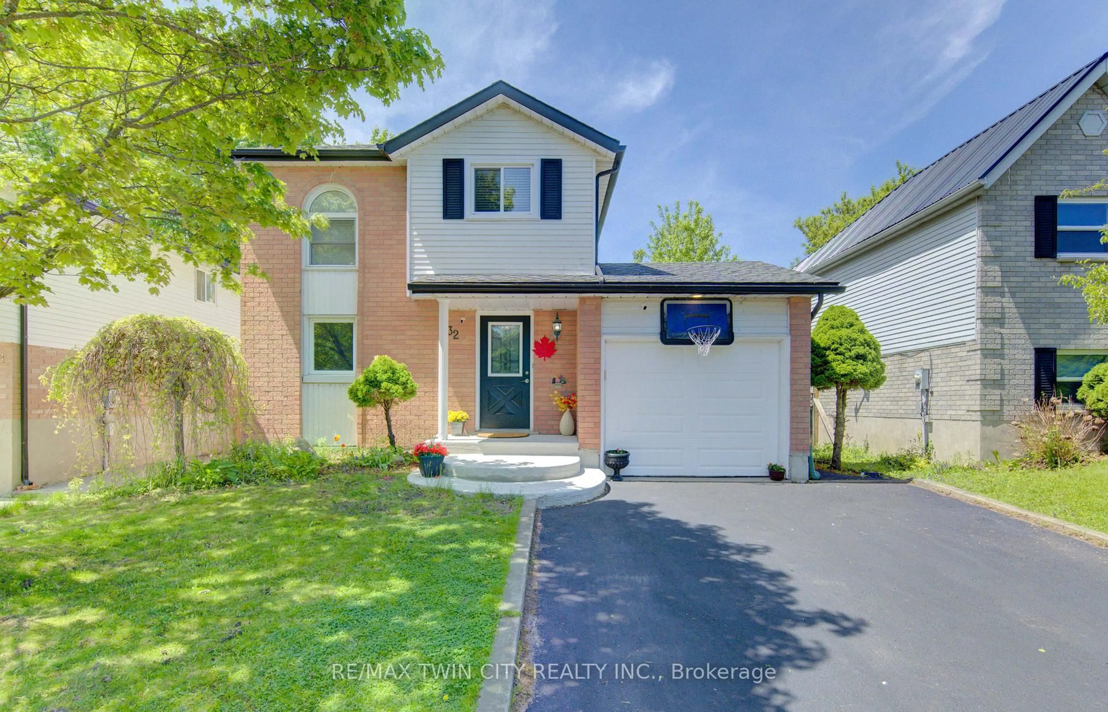 Home with brick exterior material, street for 32 ENFIELD Dr, Cambridge Ontario N1P 1A5