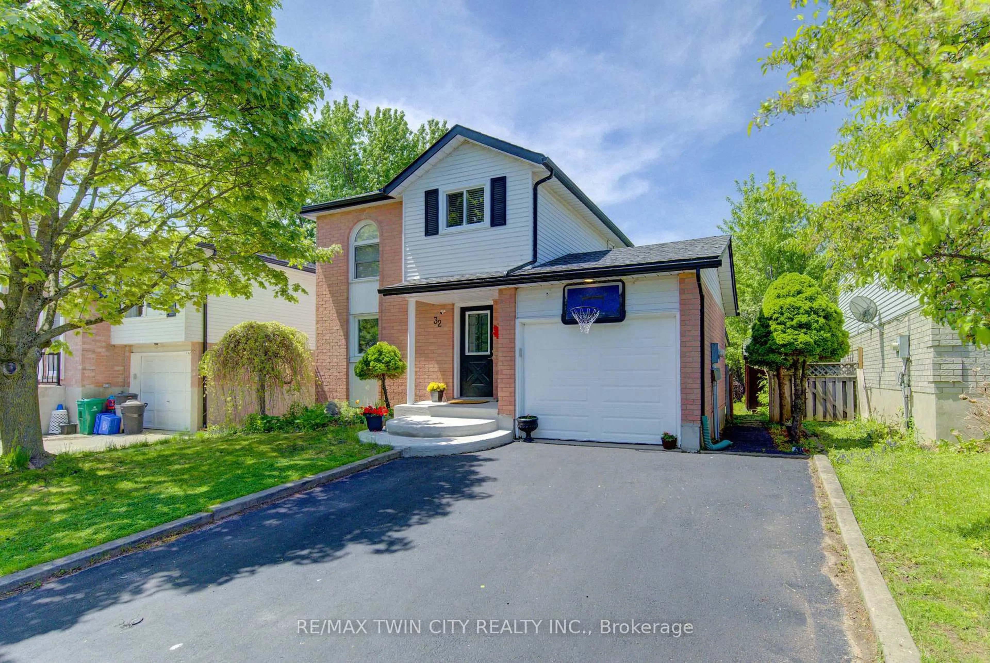 Home with brick exterior material, street for 32 ENFIELD Dr, Cambridge Ontario N1P 1A5