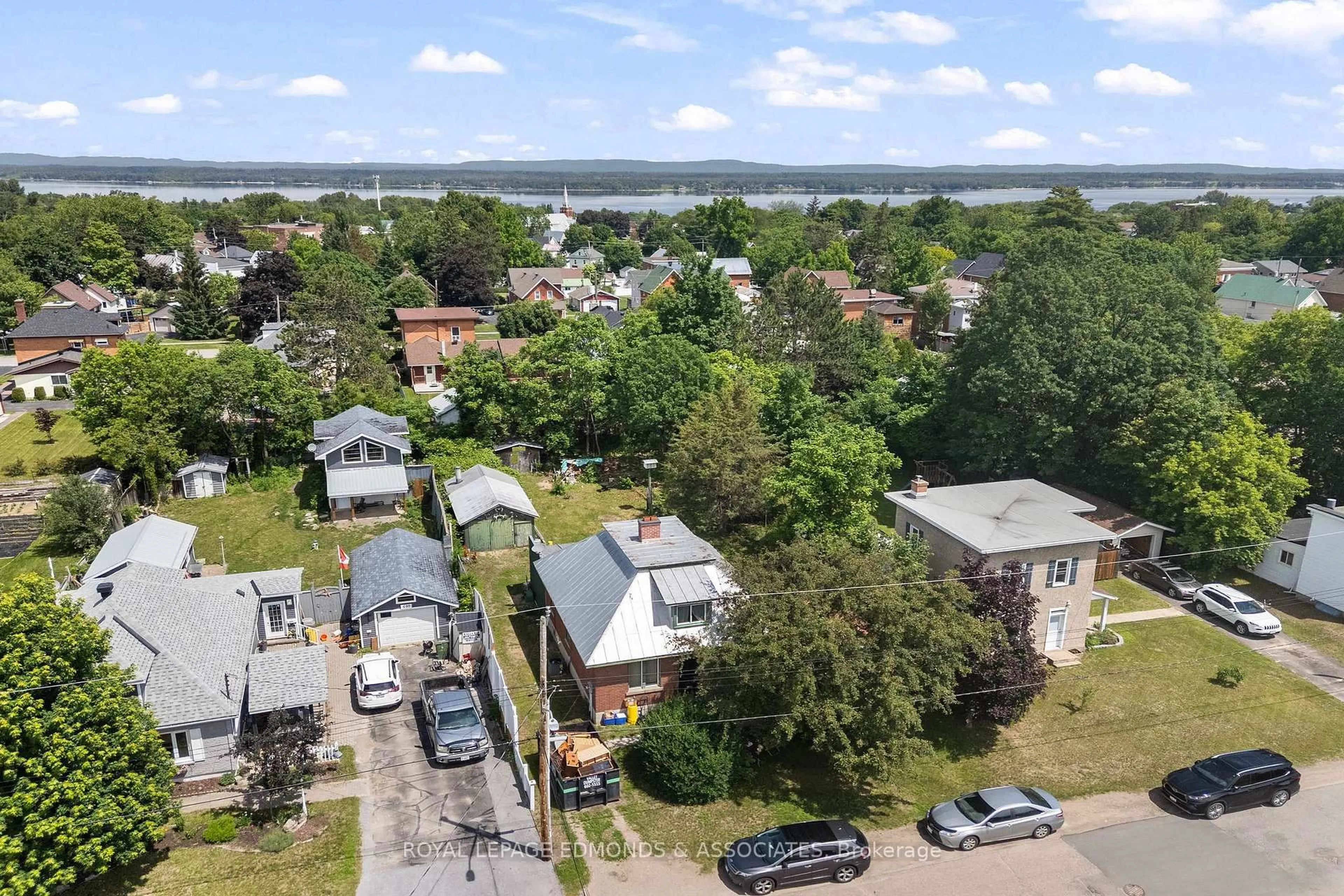 A pic from outside/outdoor area/front of a property/back of a property/a pic from drone, water/lake/river/ocean view for 605 Perth St, Pembroke Ontario K8A 6B9