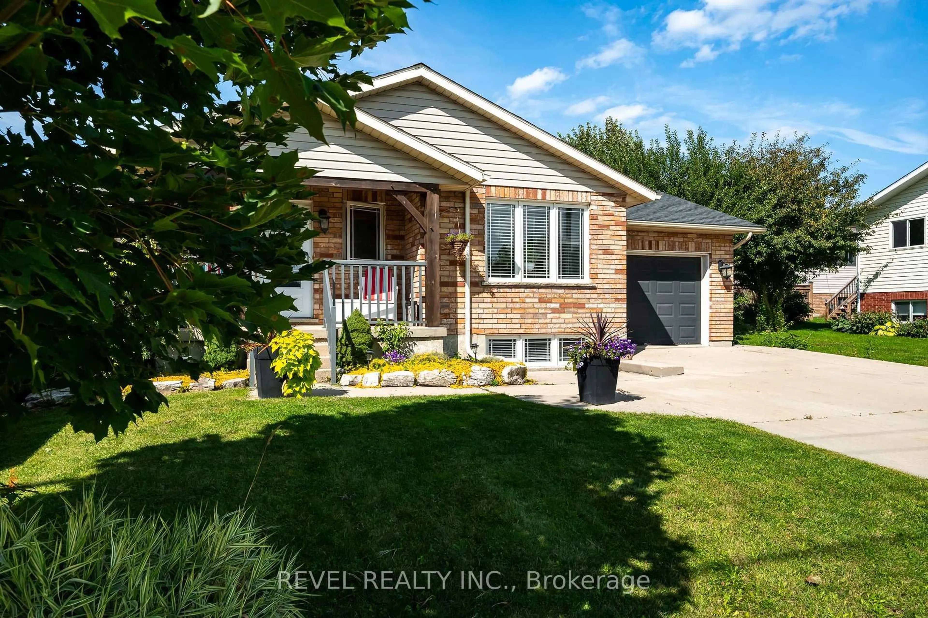 Home with vinyl exterior material, street for 771 Princess St, Wellington North Ontario N0G 2L3
