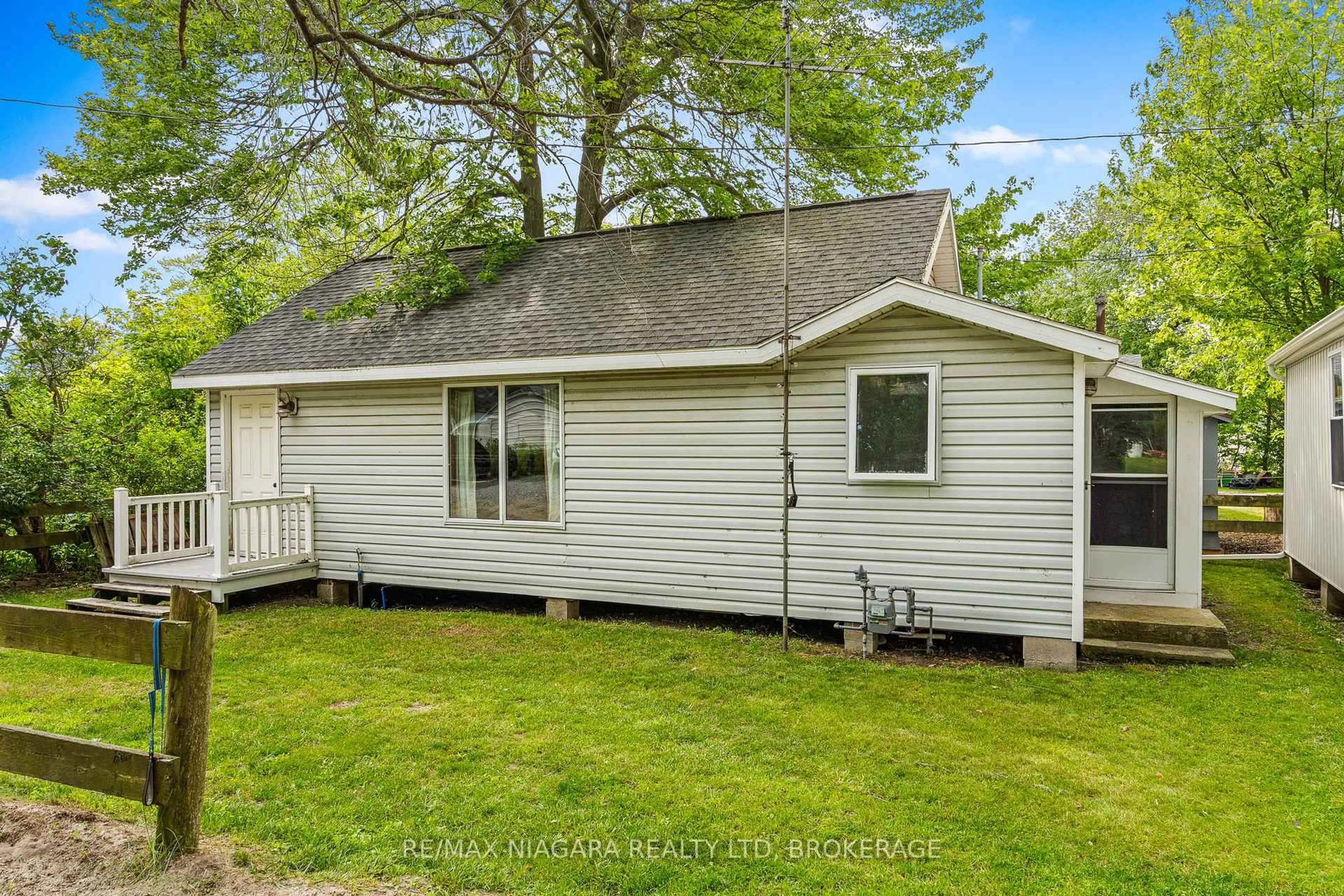 Home with vinyl exterior material, street for 12213 Lakeshore Rd, Wainfleet Ontario L0S 1V0