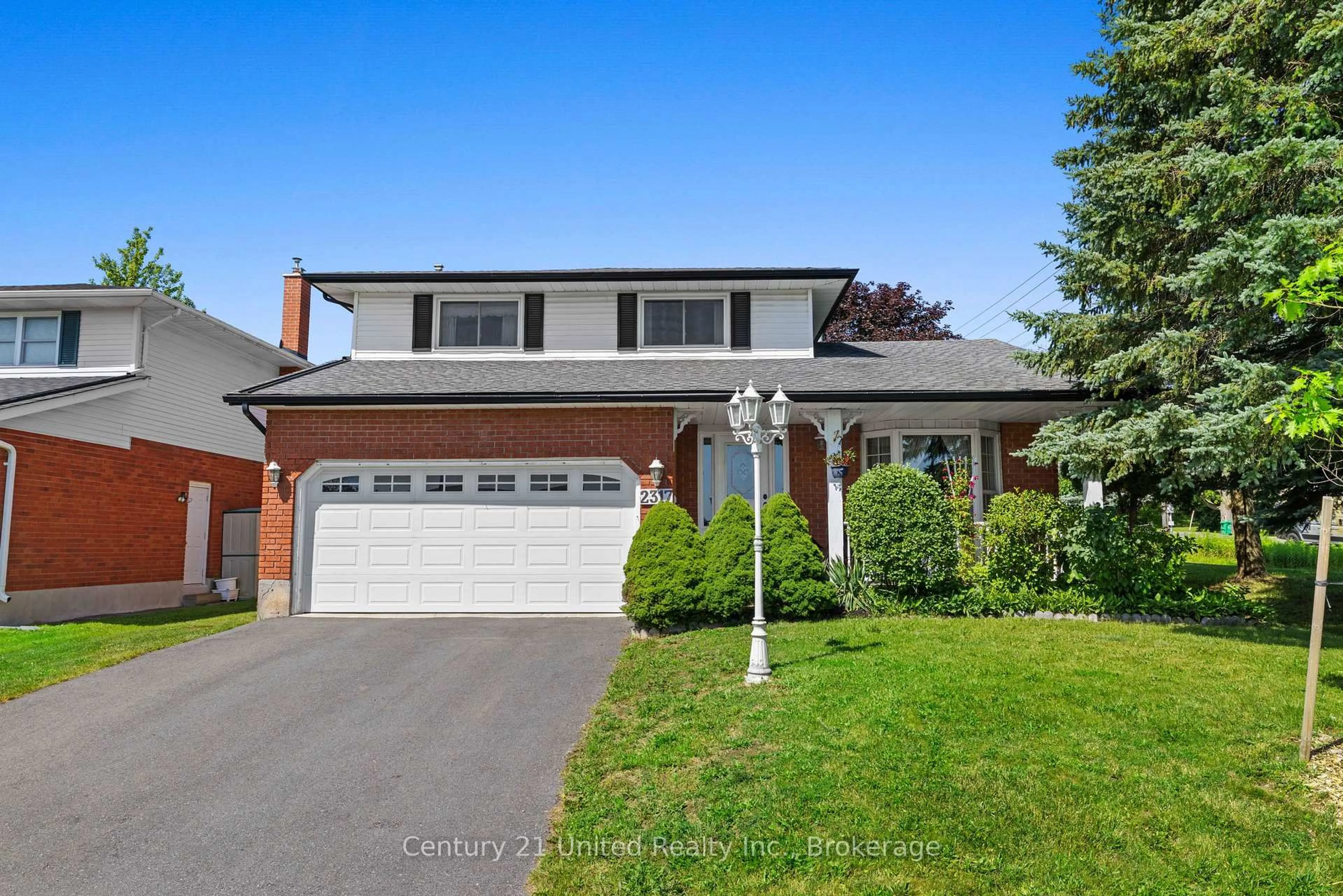 Home with brick exterior material, street for 2317 Woodglade Blvd, Peterborough Ontario K9K 1T6