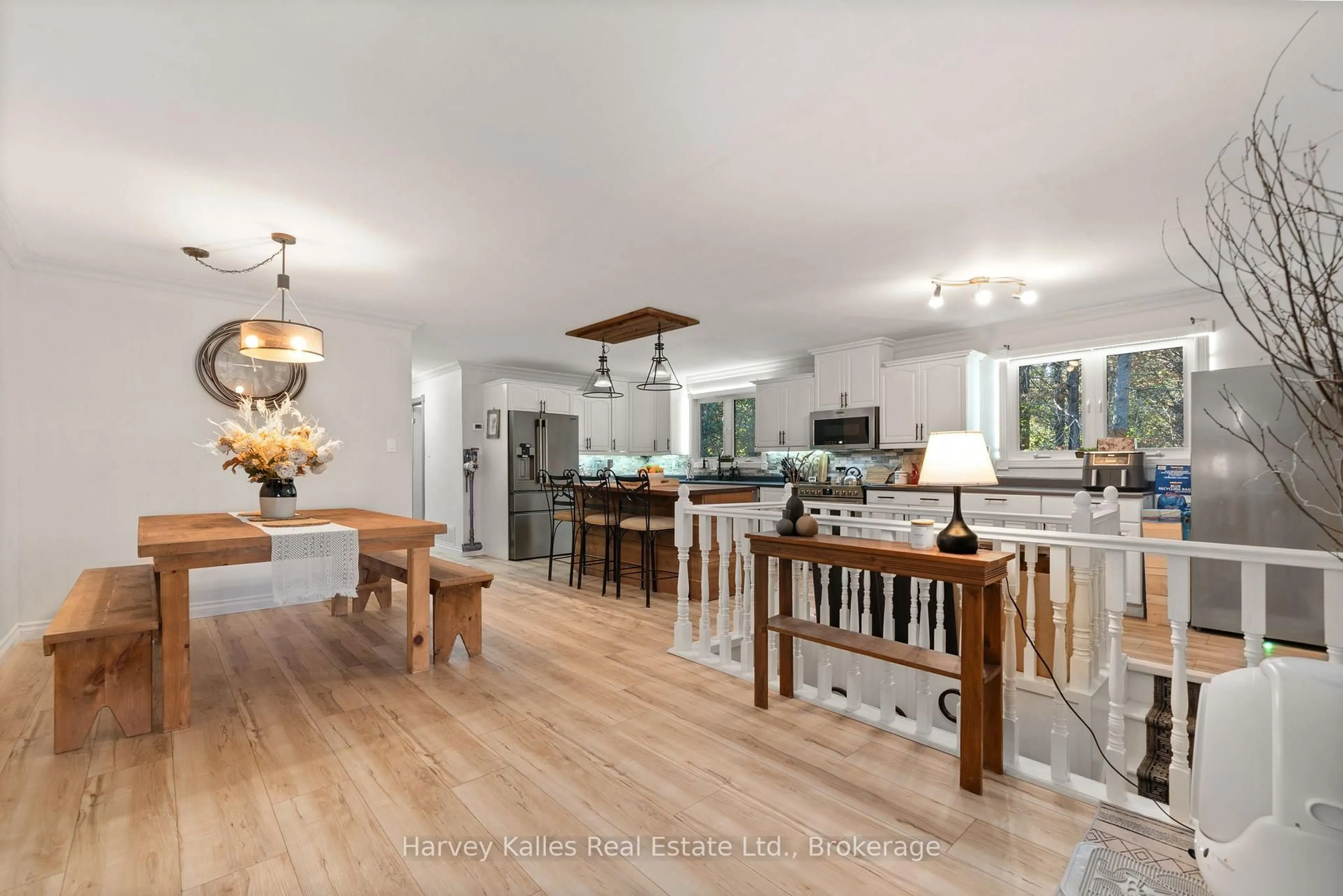 Open concept kitchen, wood/laminate floor for 12130 Loyalist Pkwy, Prince Edward County Ontario K0K 2T0
