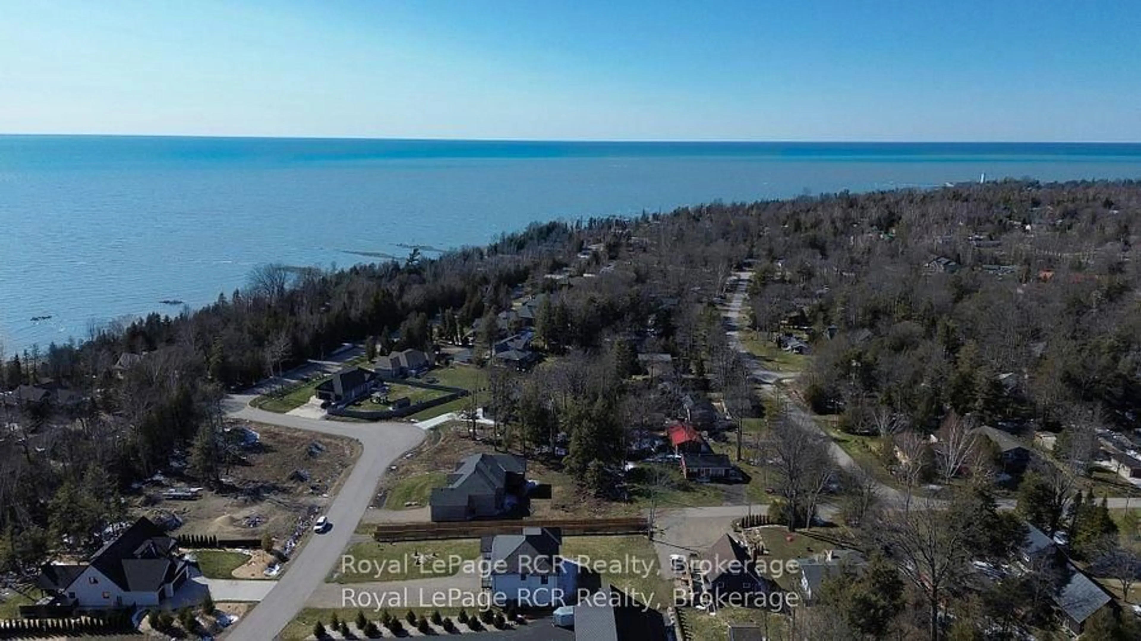 A pic from outside/outdoor area/front of a property/back of a property/a pic from drone, water/lake/river/ocean view for 9 Sunset Pl, Huron-Kinloss Ontario N0G 2R0