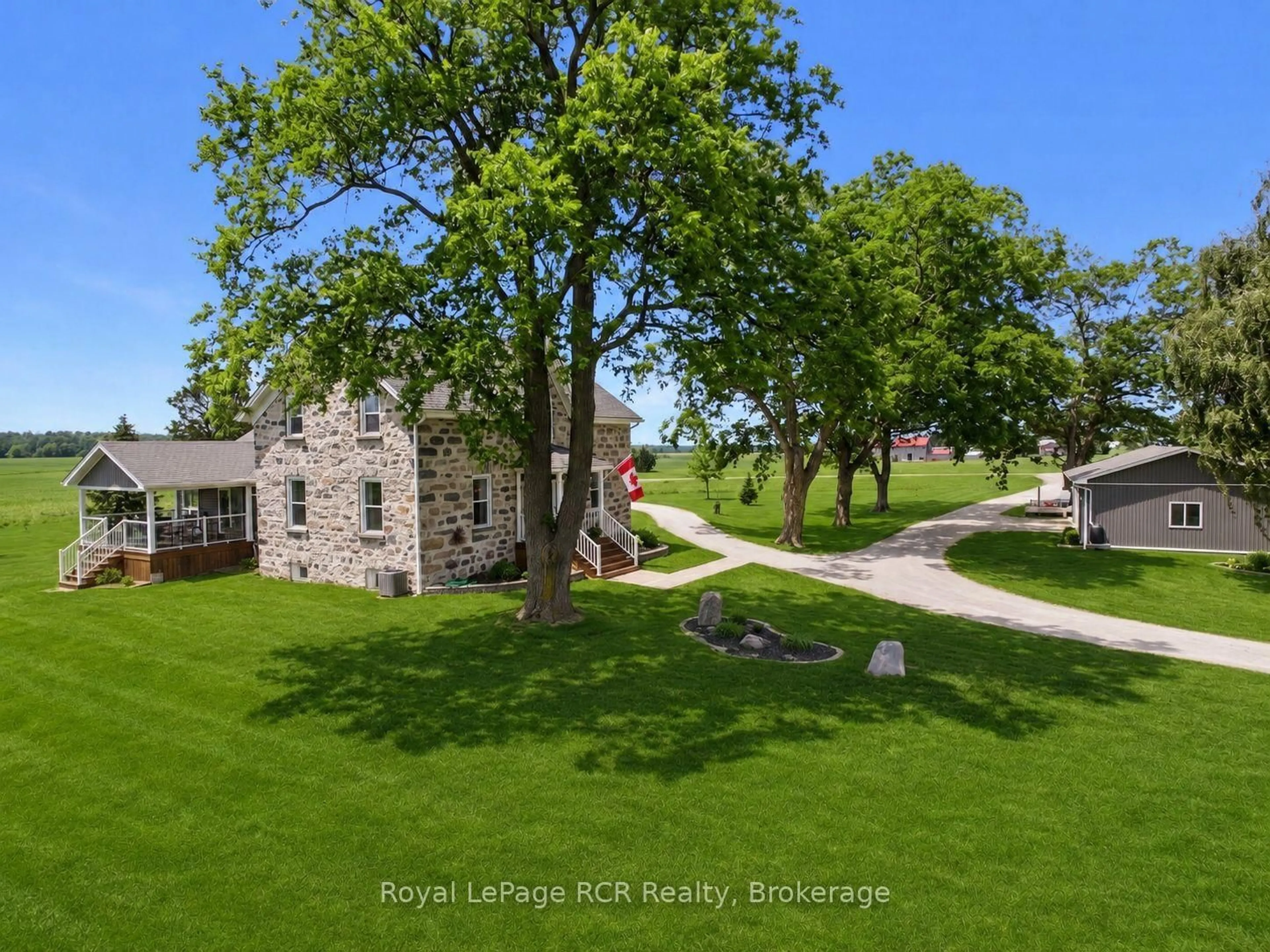 A pic from outside/outdoor area/front of a property/back of a property/a pic from drone, street for 39721 Amberly Rd, North Huron Ontario N0G 2W0