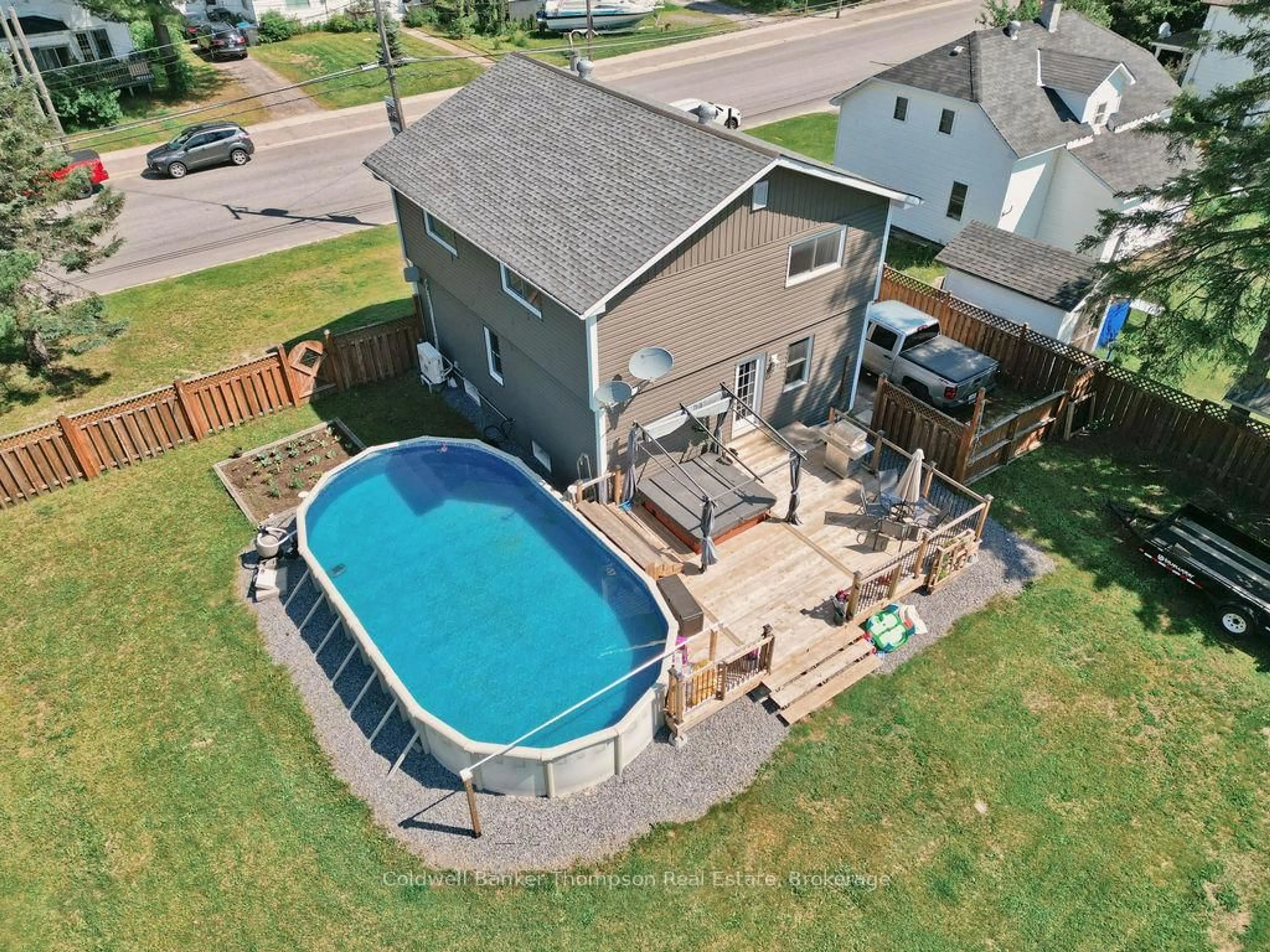 A pic from outside/outdoor area/front of a property/back of a property/a pic from drone, water/lake/river/ocean view for 115 Ottawa Ave, South River Ontario P0A 1X0